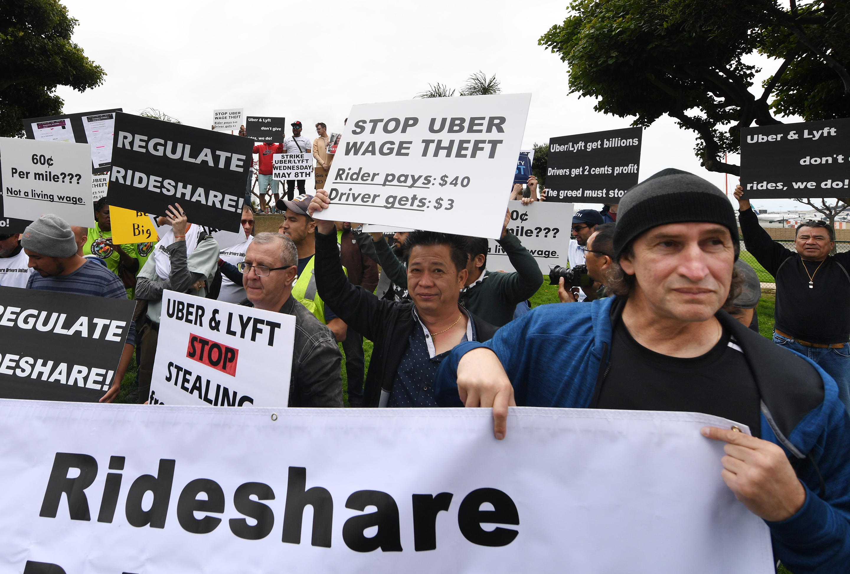 Uber and Lyft stage a strike and protest at the LAX