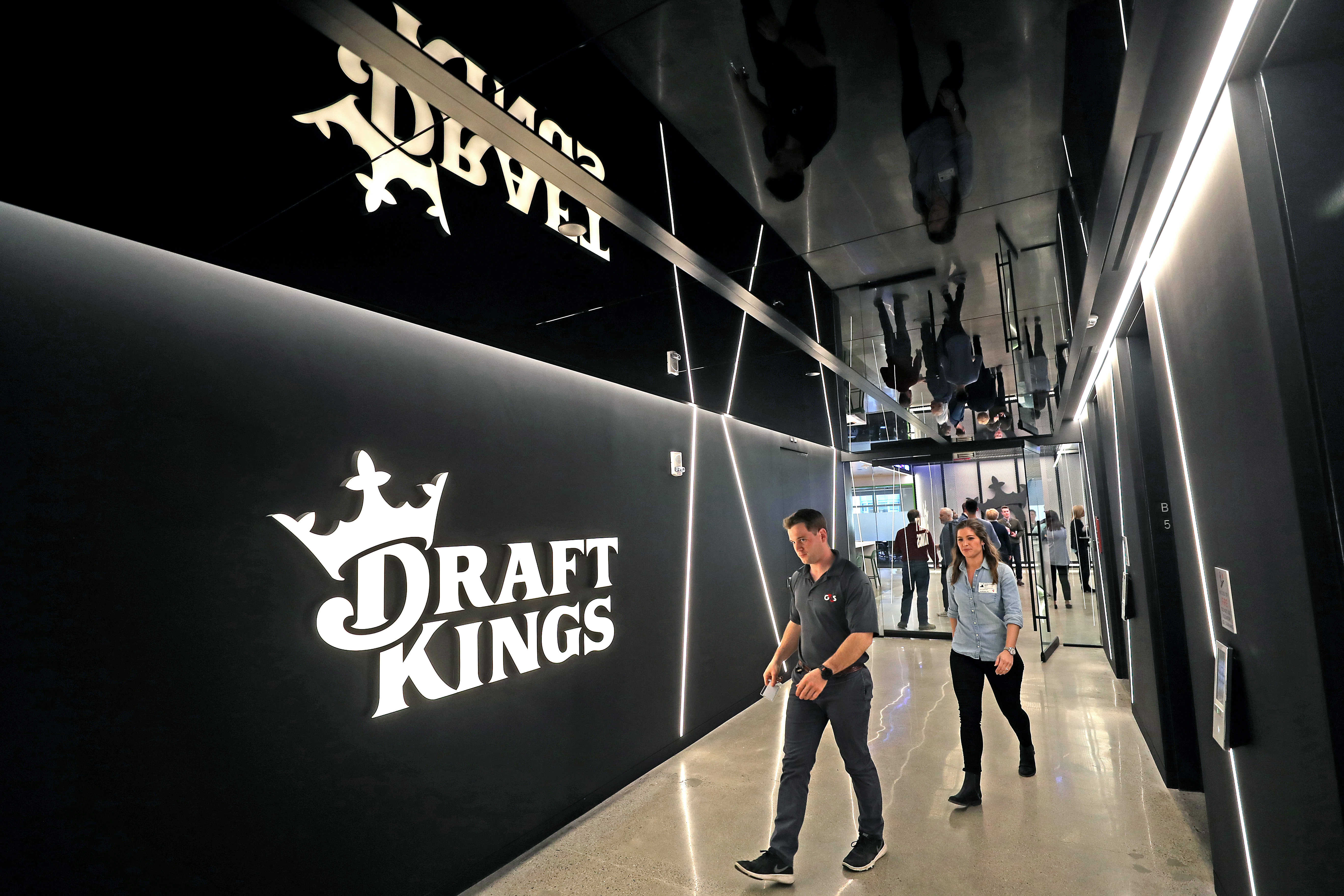BOSTON, MA - MARCH 25: The entrance from the elevators, designed to resemble a tunnel entering a stadium, is pictured at the new DraftKings office in Boston on March 25, 2019. DraftKings is opening its new office in the Back Bay, where it says it will eventually grow its work force to about 600. The company, which made its name in daily fantasy sports, is moving into sports betting, an area where it sees big growth.