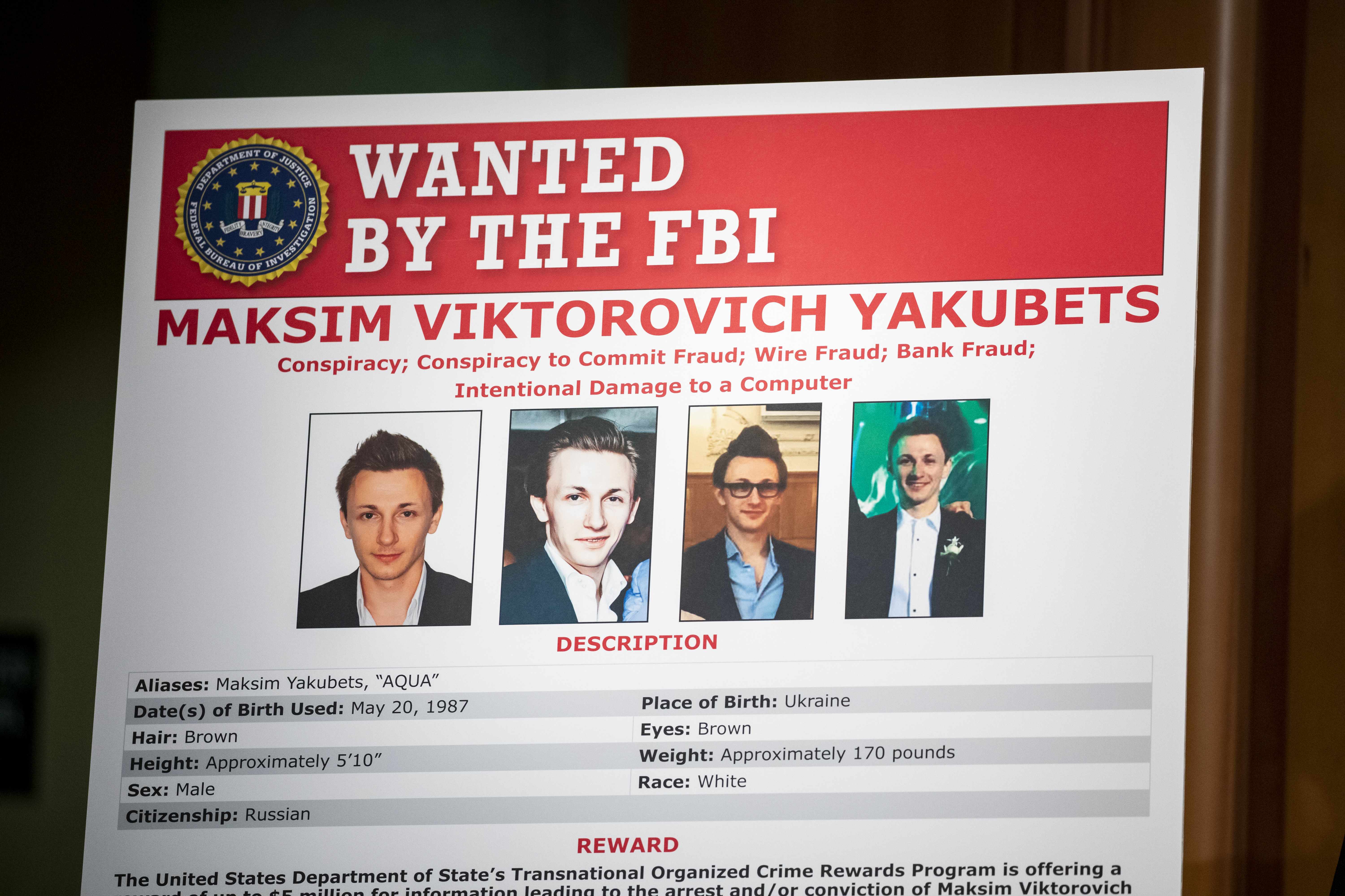 The wanted poster of Maksim Viktorovich Yakubets, also known as AQUA, who is one of two alleged Russian hackers that U.S. and U.K.