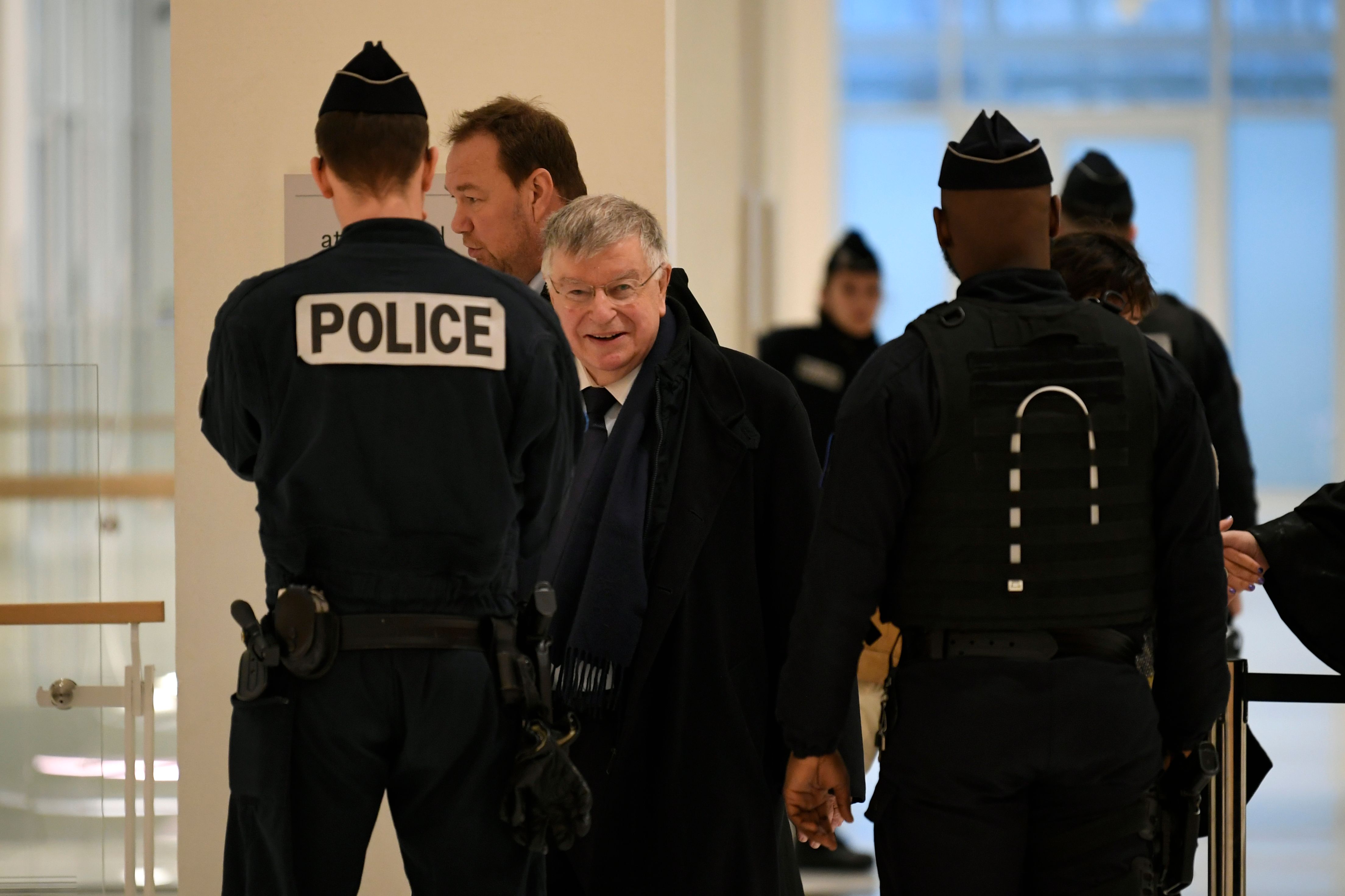 Former France Telecom CEO Didier Lombard (C) arrives at Paris Courthouse on December 20, 2019 for the ruling in France Telecom trial over series of suicides. - Paris' court gives its judgment on December 20, 2019 in the trial of several former members of France Telecom's management for "moral harassment". (Photo by Lionel BONAVENTURE / AFP) (Photo by LIONEL BONAVENTURE/AFP via Getty Images)
