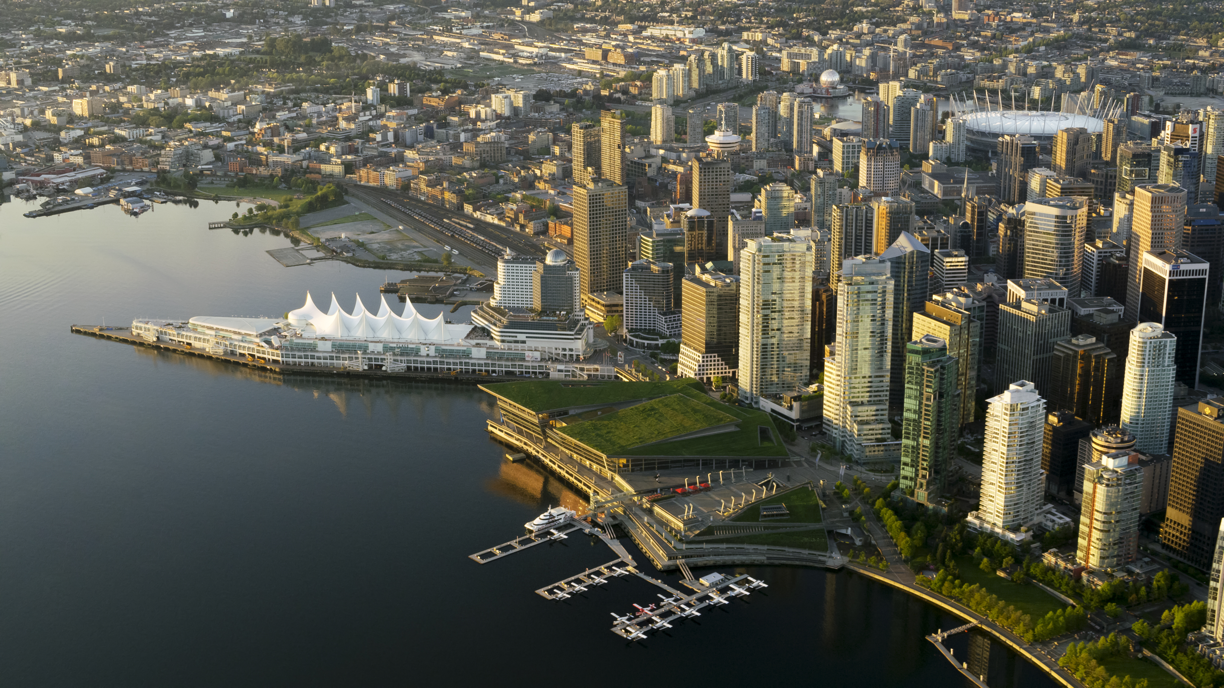 Aerial photo of Vancouver cityscape with Canada Place in the center.