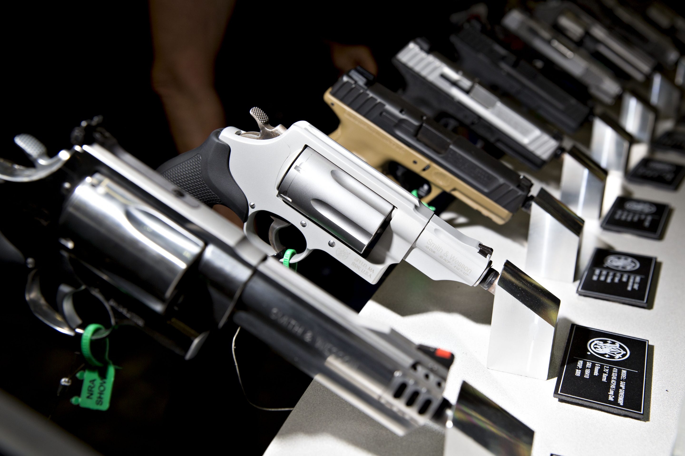 Pistols and revolvers sit on display in the Smith & Wesson Corp. booth during the National Rifle Association (NRA) annual meeting in Dallas, Texas, U.S., on Saturday, May 5, 2018. President Donald Trump delivered a strong sign of support for the National Rifle Association at its annual meeting on Friday, as gun-rights advocates regroup in the wake of the mass shooting at a Florida high school. Photographer: Daniel Acker/Bloomberg via Getty Images