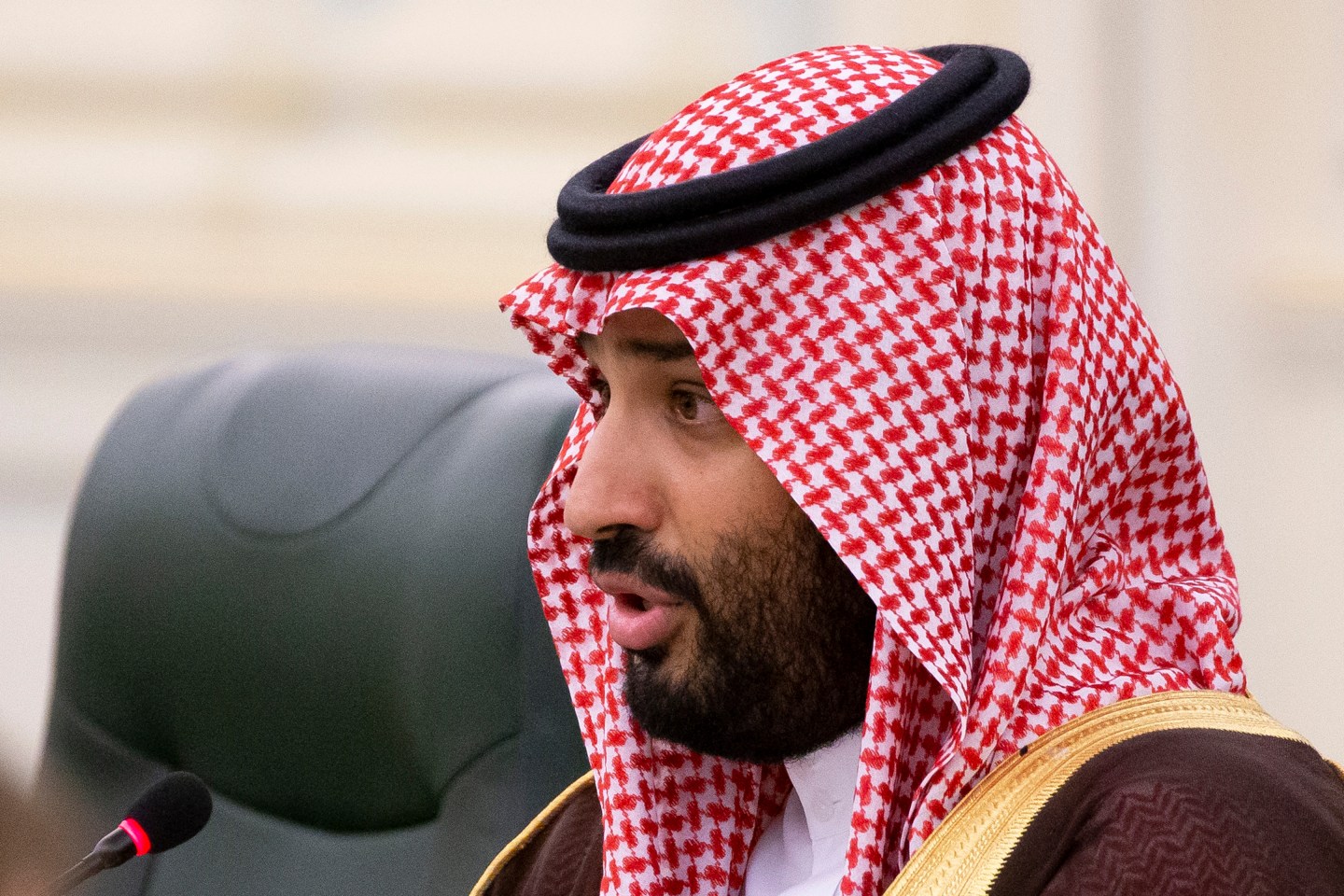 FILE - In this Oct. 14, 2019 file photo, Saudi Arabia's Crown Prince Mohammed bin Salman speaks to Russian President Vladimir Putin during the talks in Riyadh, Saudi Arabia. United Nations experts Wednesday, Jan. 22, 2020 called for an "immediate investigation" by the United States and others into information they received that suggests that Jeff Bezos' phone was hacked after receiving a file sent from Saudi Crown Prince Mohammed bin Salman's WhatsApp account. (AP Photo/Alexander Zemlianichenko, Pool)