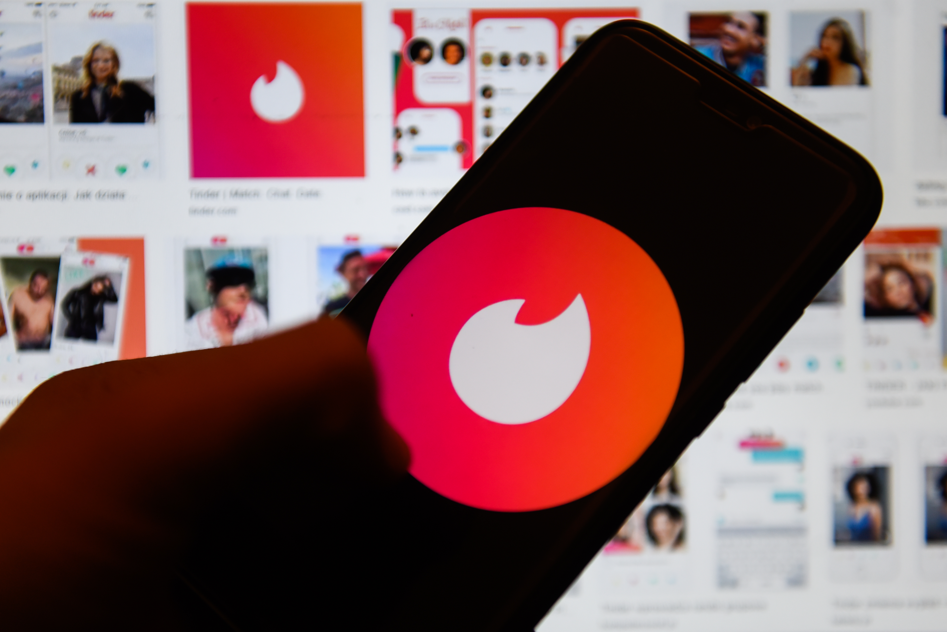 POLAND - 2020/01/06: In this photo illustration a Tinder logo seen displayed on a smartphone. (Photo Illustration by Omar Marques/SOPA Images/LightRocket via Getty Images)