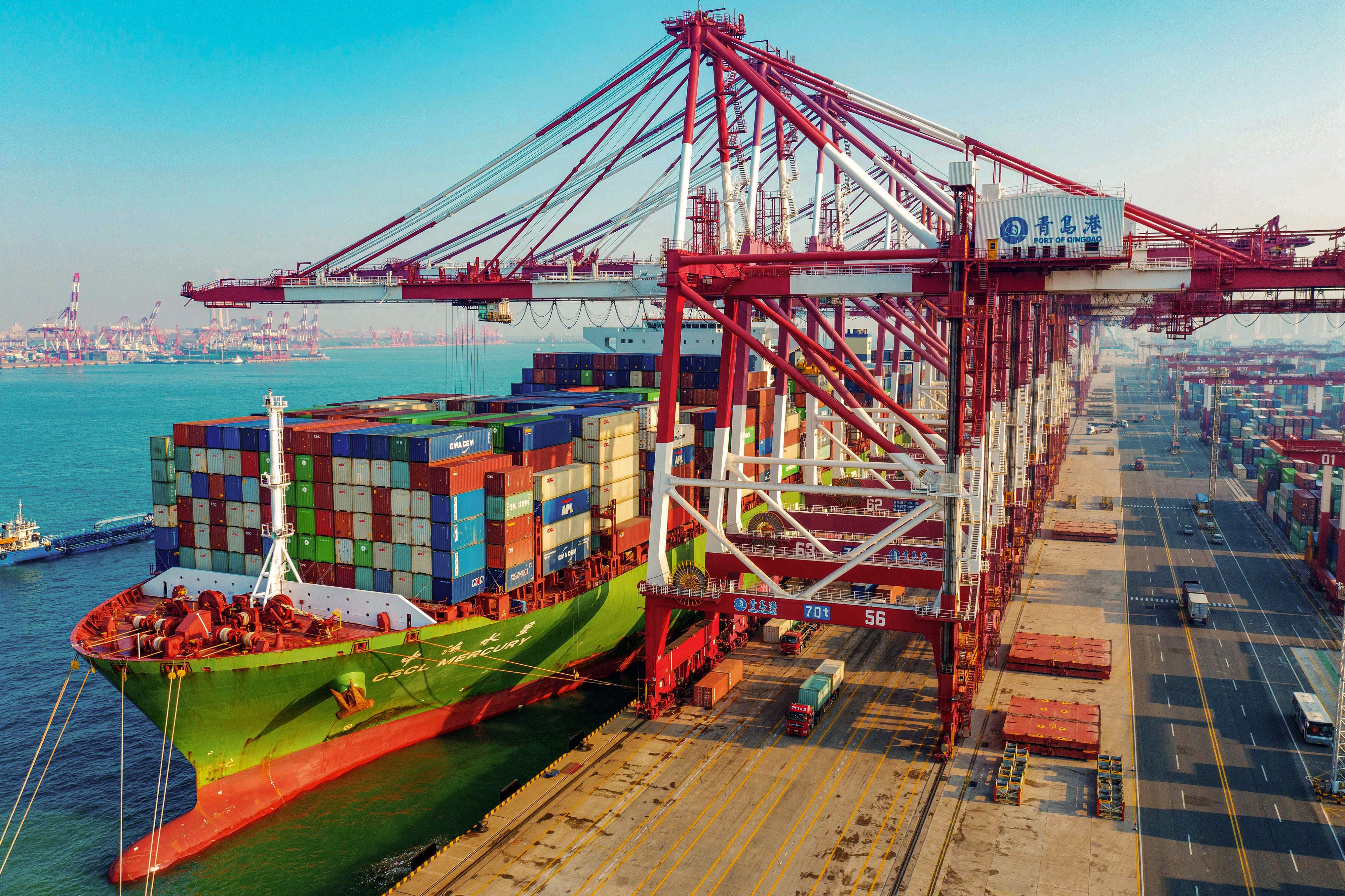 A cargo ship loaded with containers berths at a port in Qingdao in China's eastern Shandong province on January 14, 2020. - China's trade surplus with the United States narrowed last year as the world's two biggest economies exchanged punitive tariffs in a bruising trade war, official data showed on January 14, on the eve of a deal to ease tensions. (Photo by STR / AFP) (Photo by STR/AFP via Getty Images)