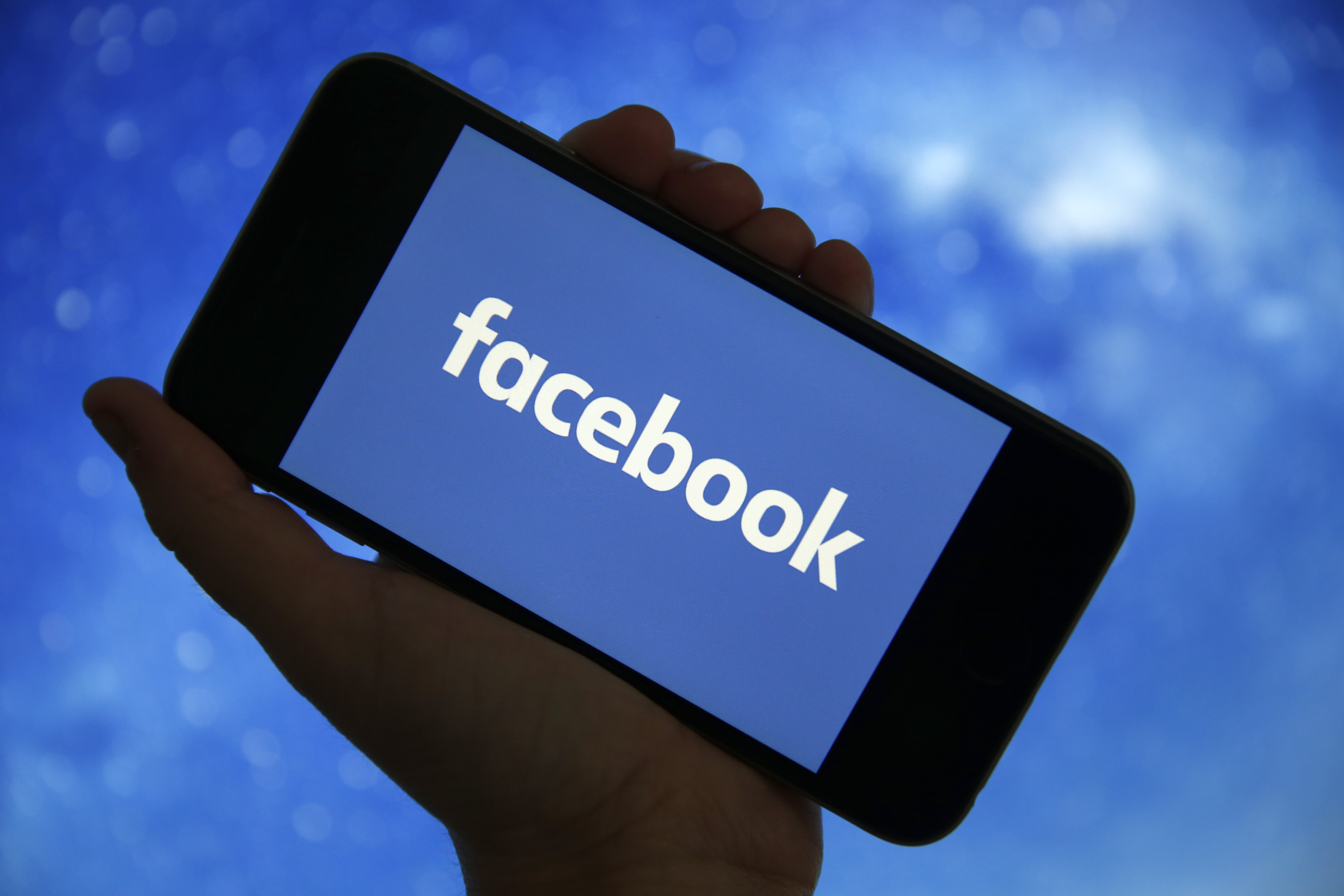 Facebook's logo is displayed on the screen of an iPhone on December 26, 2019 in Paris, France. The American company Facebook created in 2004 by Mark Zuckerberg builds technologies that give people the power to connect with friends and family, find communities and grow businesses.