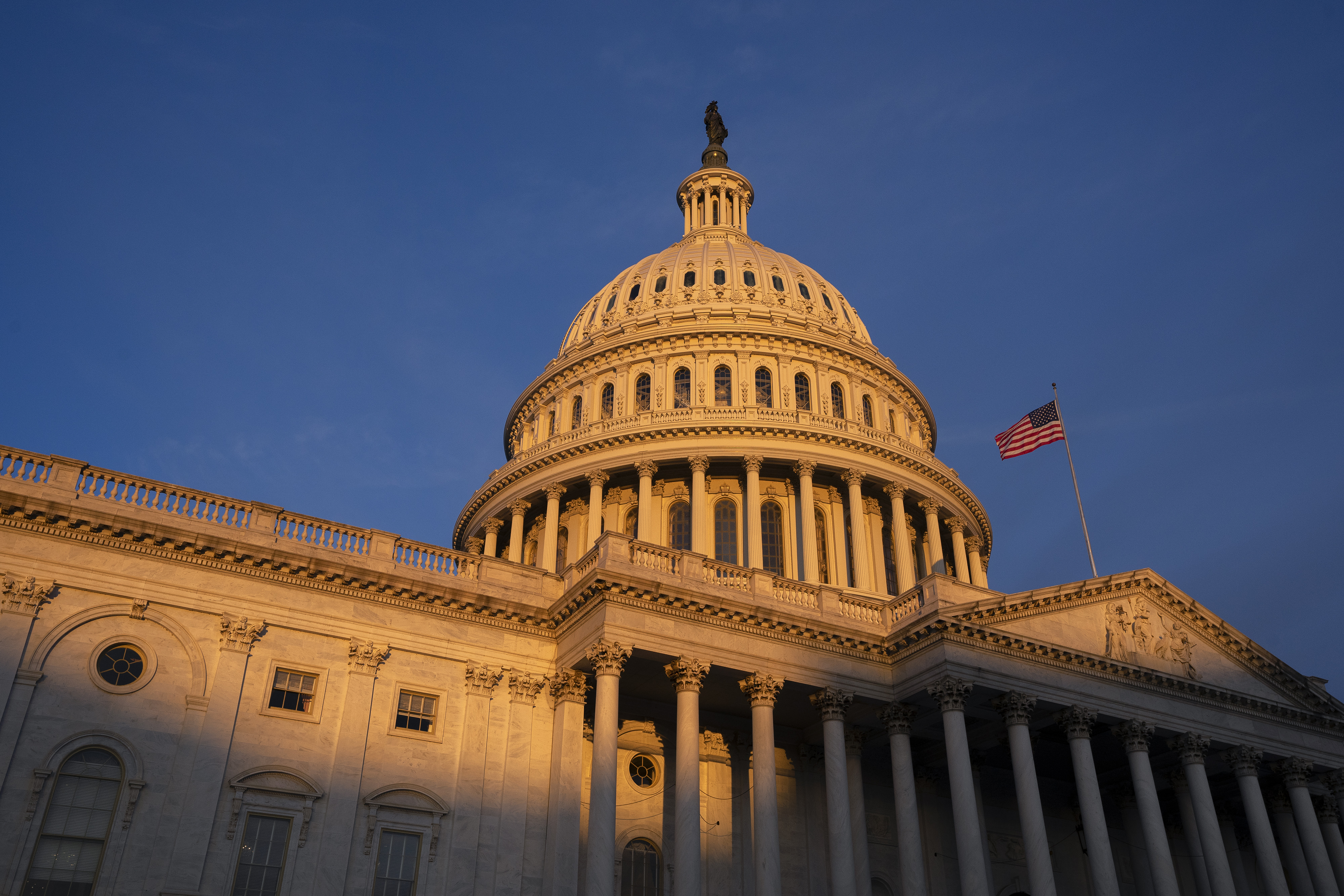 An American flag flies at the U.S. Capitol in Washington, D.C., U.S., on Thursday, Jan. 30, 2020.