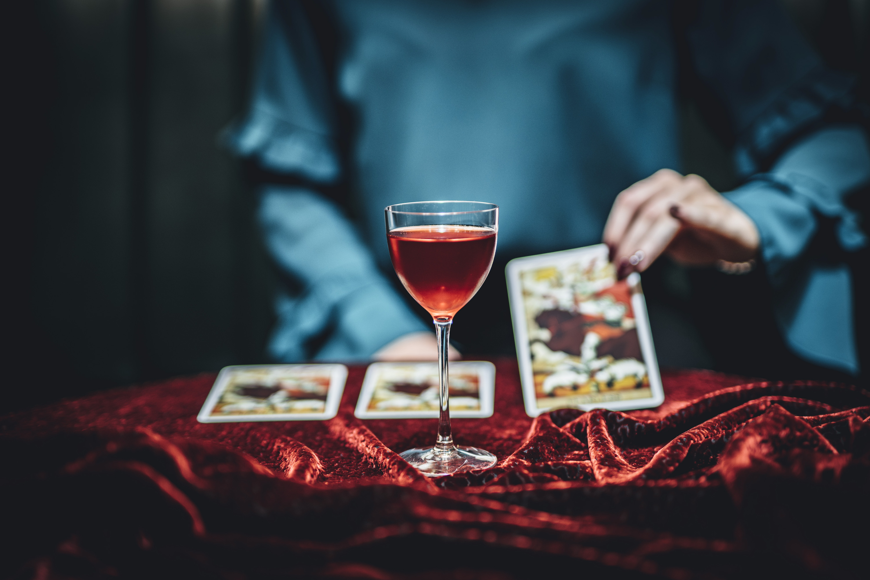 If the Bloomsbury Club's "Cocktail Diviner" lands on the "Dreamy" card, get ready to "leave the realm of dreams and enter a productive reality with the Mirror Image cocktail featuring Mount Gay XO rum, beeswax-infused Rémy Martin, green chartreuse, absinthe, and blackberry tincture.