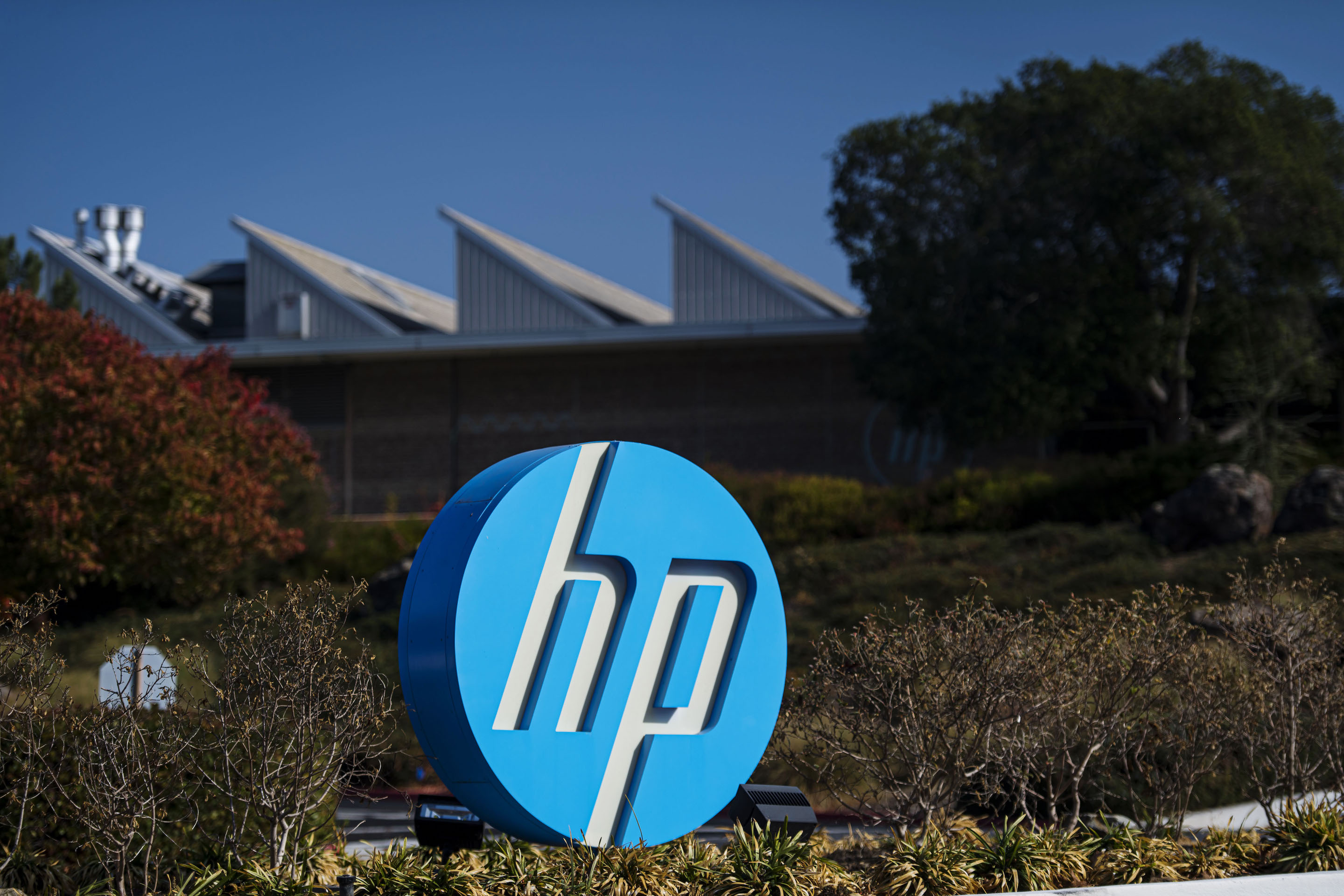 Signage is displayed outside HP Inc. headquarters in Palo Alto, California, U.S., on Thursday, Nov. 7, 2019. HP plans $15 billion in share buybacks, the company announced Monday, up $10 billion from the $5 billion share repurchase authorization program the company announced in fall.