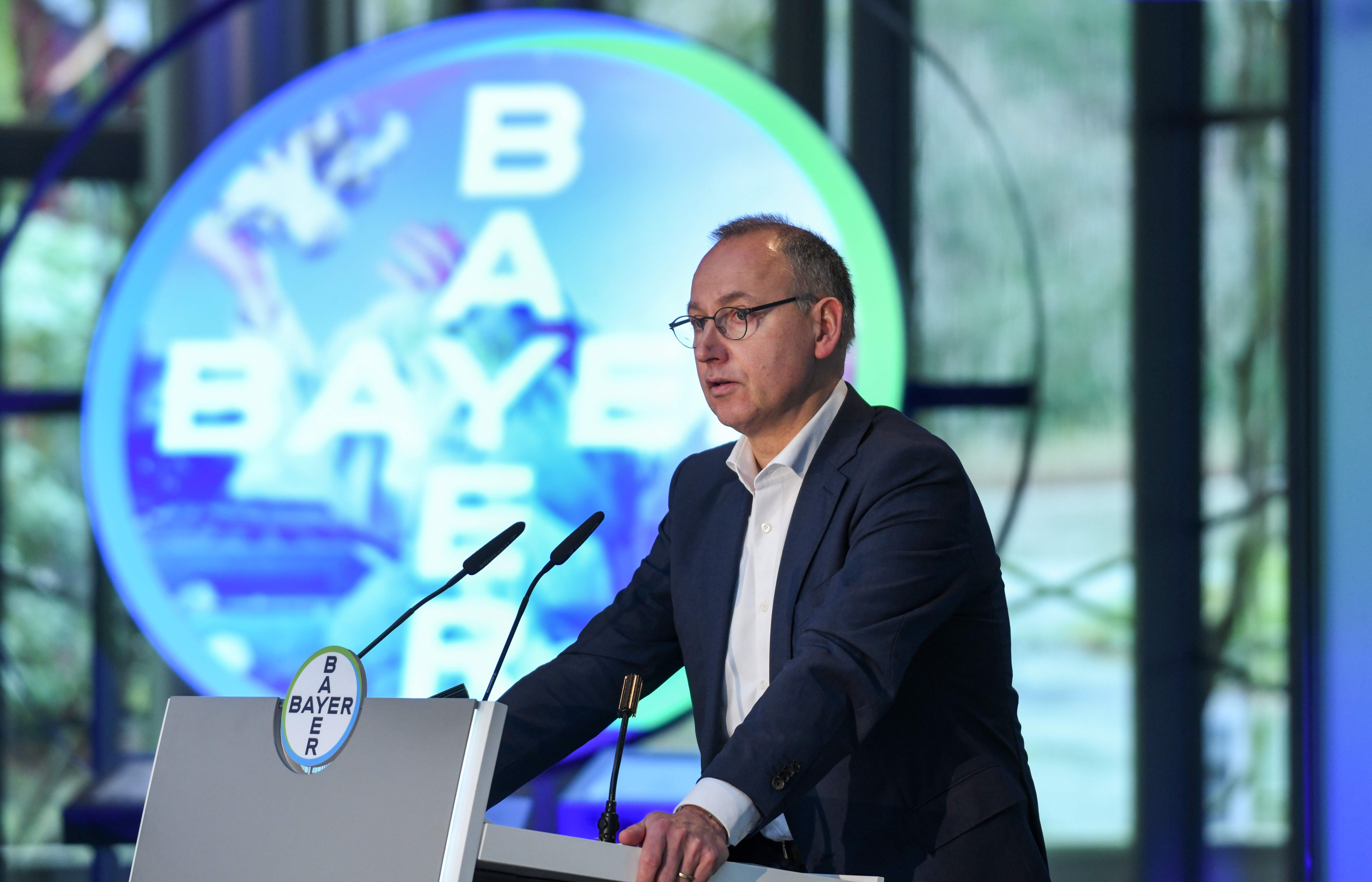 The CEO of German chemicals giant Bayer, Werner Baumann, speaks during the company's annual news conference in Leverkusen, western Germany, on February 27, 2020. - German chemical and pharmaceutical giant Bayer reported surging profits for 2019 after its buying US seeds and pesticides maker Monsanto, but remained entangled in a massive wave of lawsuits over a flagship weedkiller. (Photo by Ina FASSBENDER / AFP) (Photo by INA FASSBENDER/AFP via Getty Images)