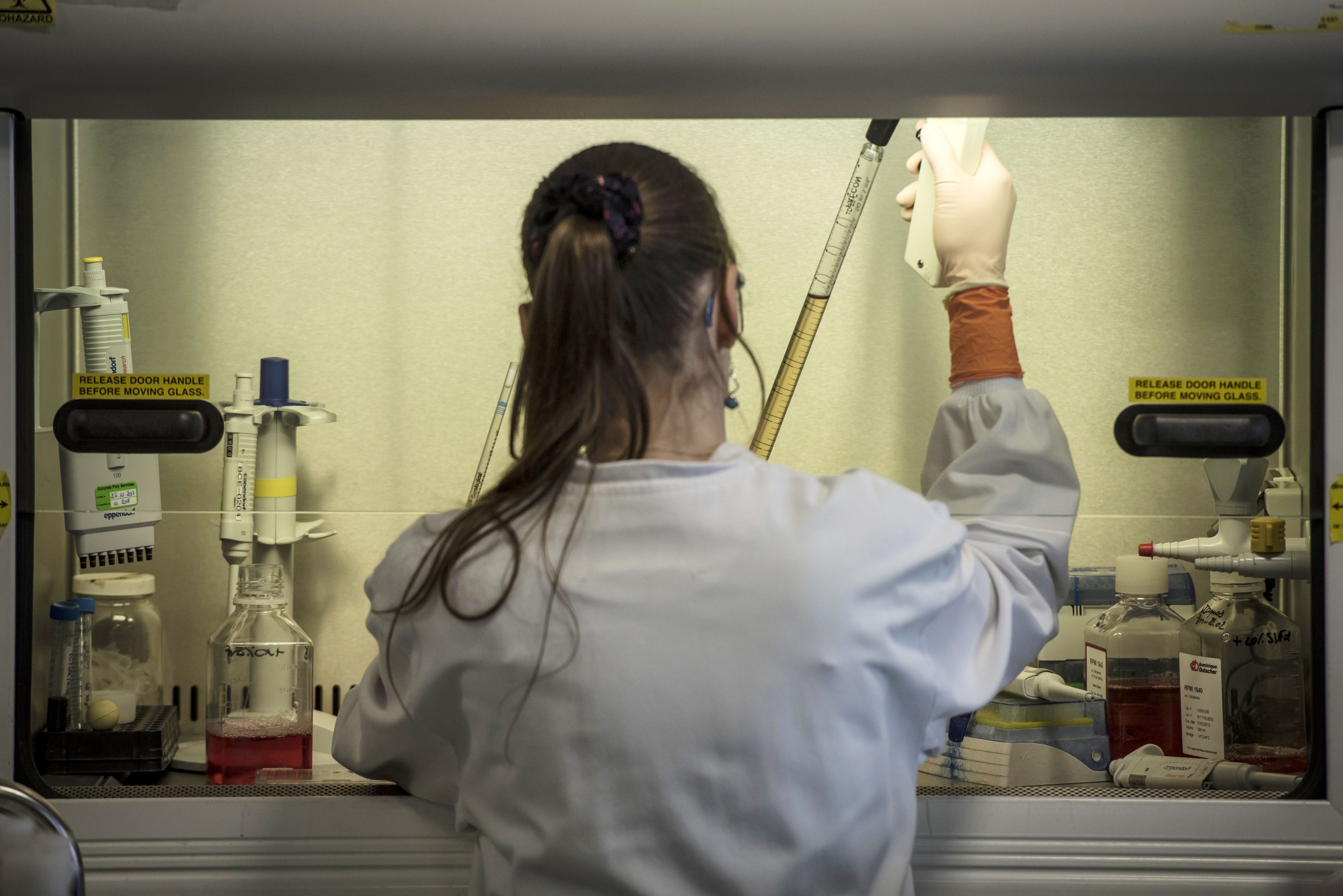 An employee and researcher works in the laboratory of the Oncodesign biopharmaceutical company on March 12, 2018 in Dijon, central eastern France. / AFP PHOTO / JEAN-PHILIPPE KSIAZEK (Photo credit should read JEAN-PHILIPPE KSIAZEK/AFP via Getty Images)