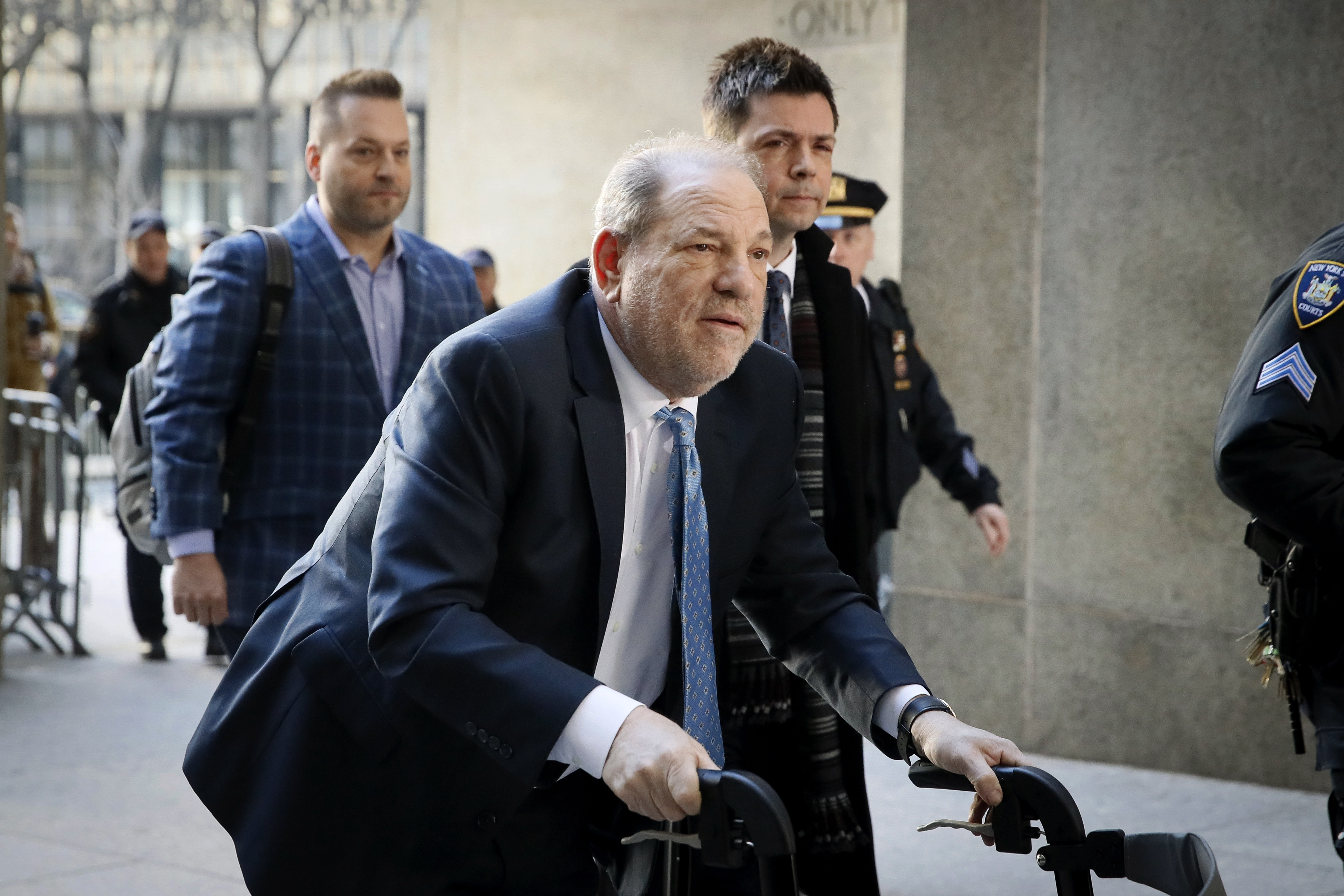 Harvey Weinstein arrives at a Manhattan courthouse as jury deliberations continue in his rape trial, Monday, Feb. 24, 2020, in New York. (AP Photo/John Minchillo)