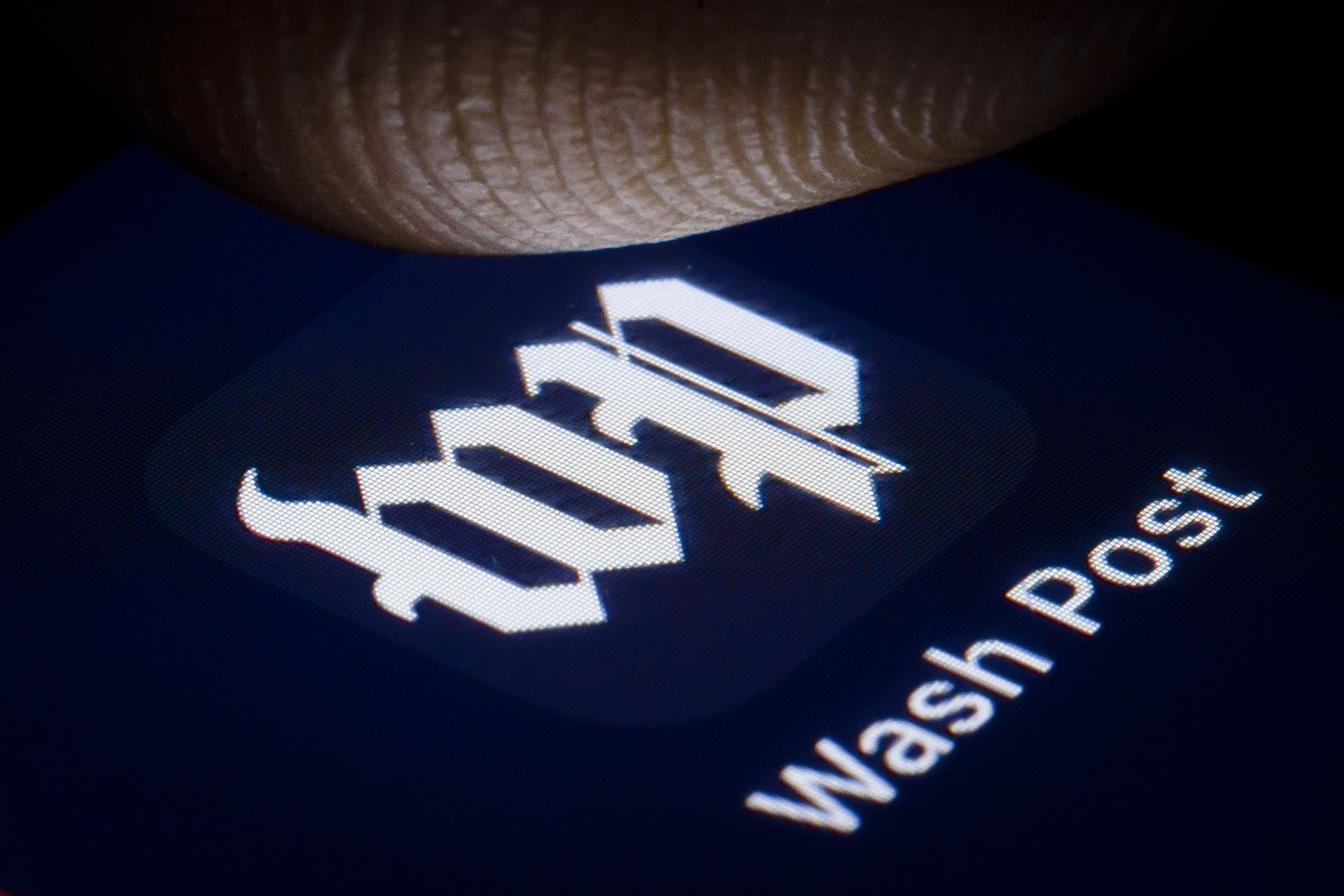 Downloads of news apps are soaring amid the coronavirus outbreak. Thomas Trutschel/Photothek via Getty Images