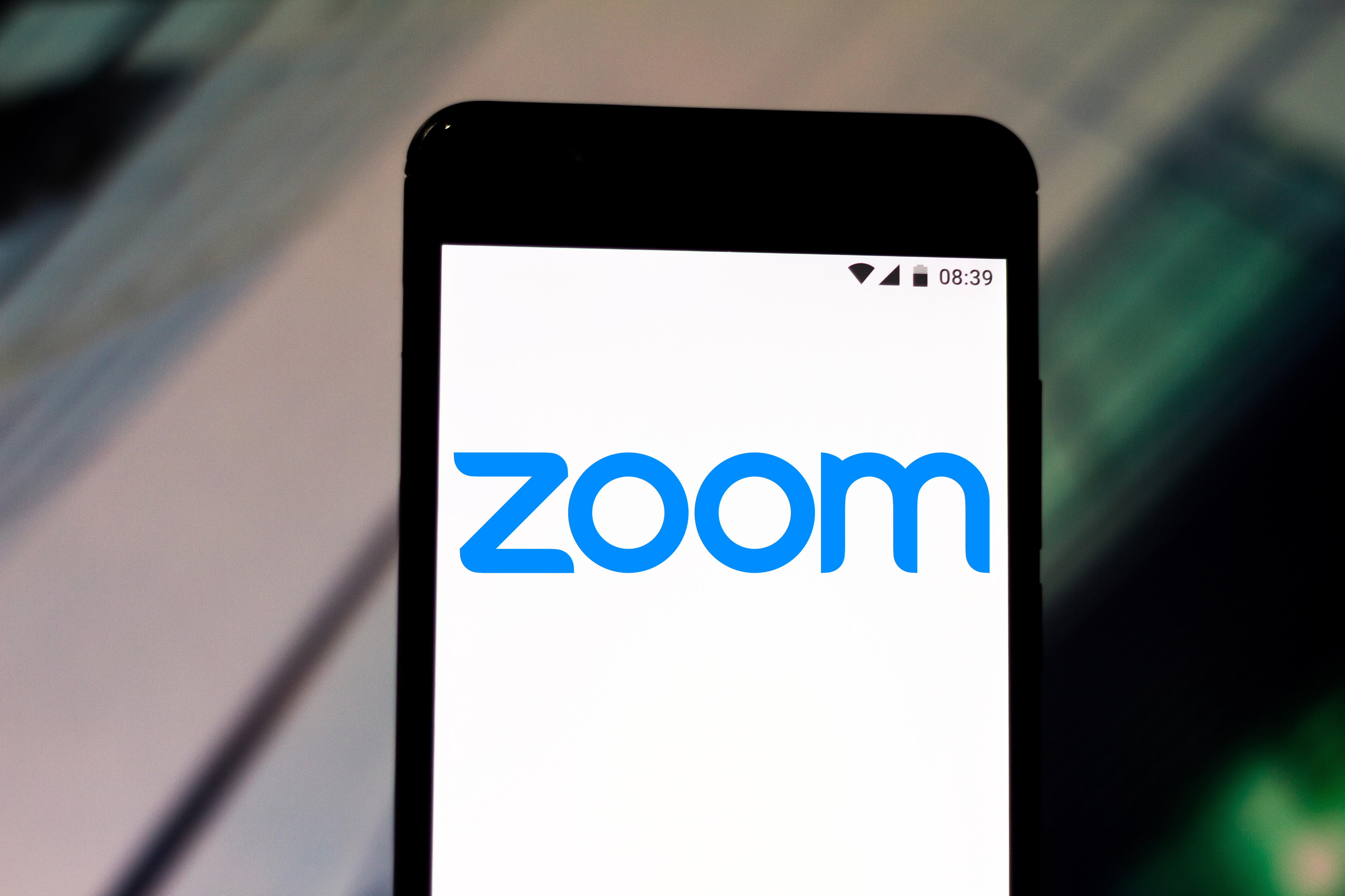 BRAZIL - 2019/07/11: In this photo illustration a Zoom Video Communications logo seen displayed on a smartphone. (Photo Illustration by Rafael Henrique/SOPA Images/LightRocket via Getty Images)