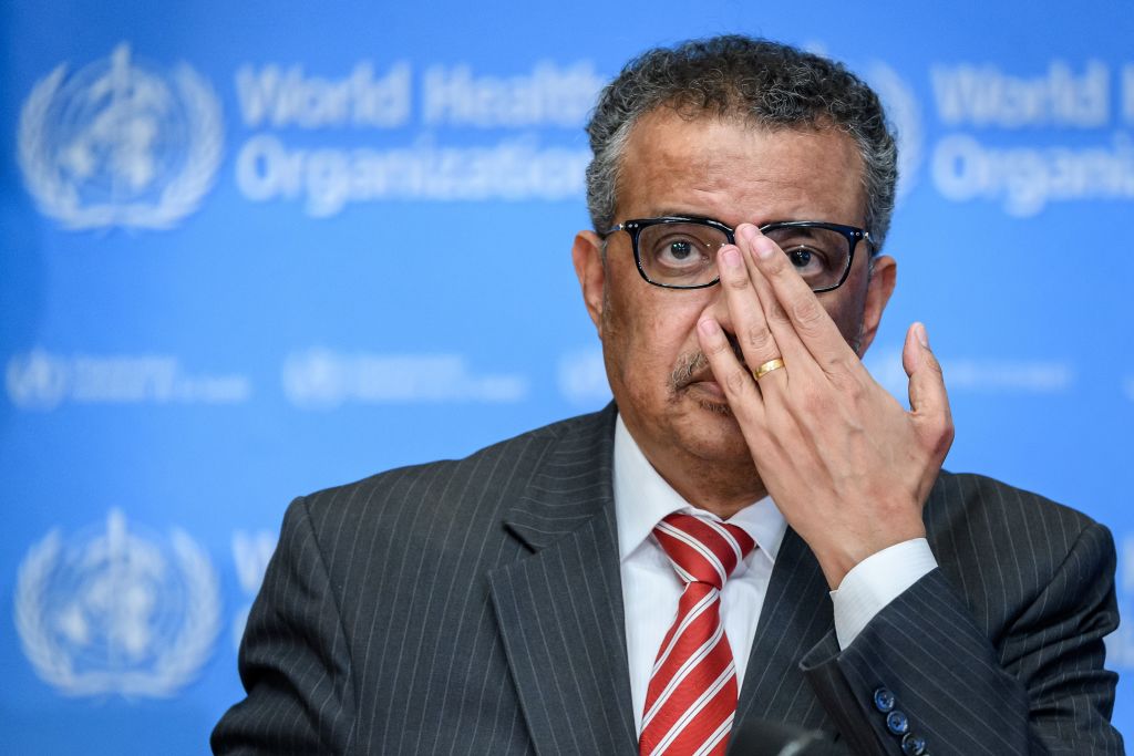 World Health Organization (WHO) Director-General Tedros Adhanom Ghebreyesus attends a daily press briefing on COVID-19, the disease caused by the novel coronavirus, at the WHO heardquaters in Geneva on March 11, 2020. - WHO Director-General Tedros Adhanom Ghebreyesus announced on March 11, 2020, that the new coronavirus outbreak can now be characterised as a pandemic. (Photo by Fabrice COFFRINI / AFP) (Photo by FABRICE COFFRINI/AFP via Getty Images)