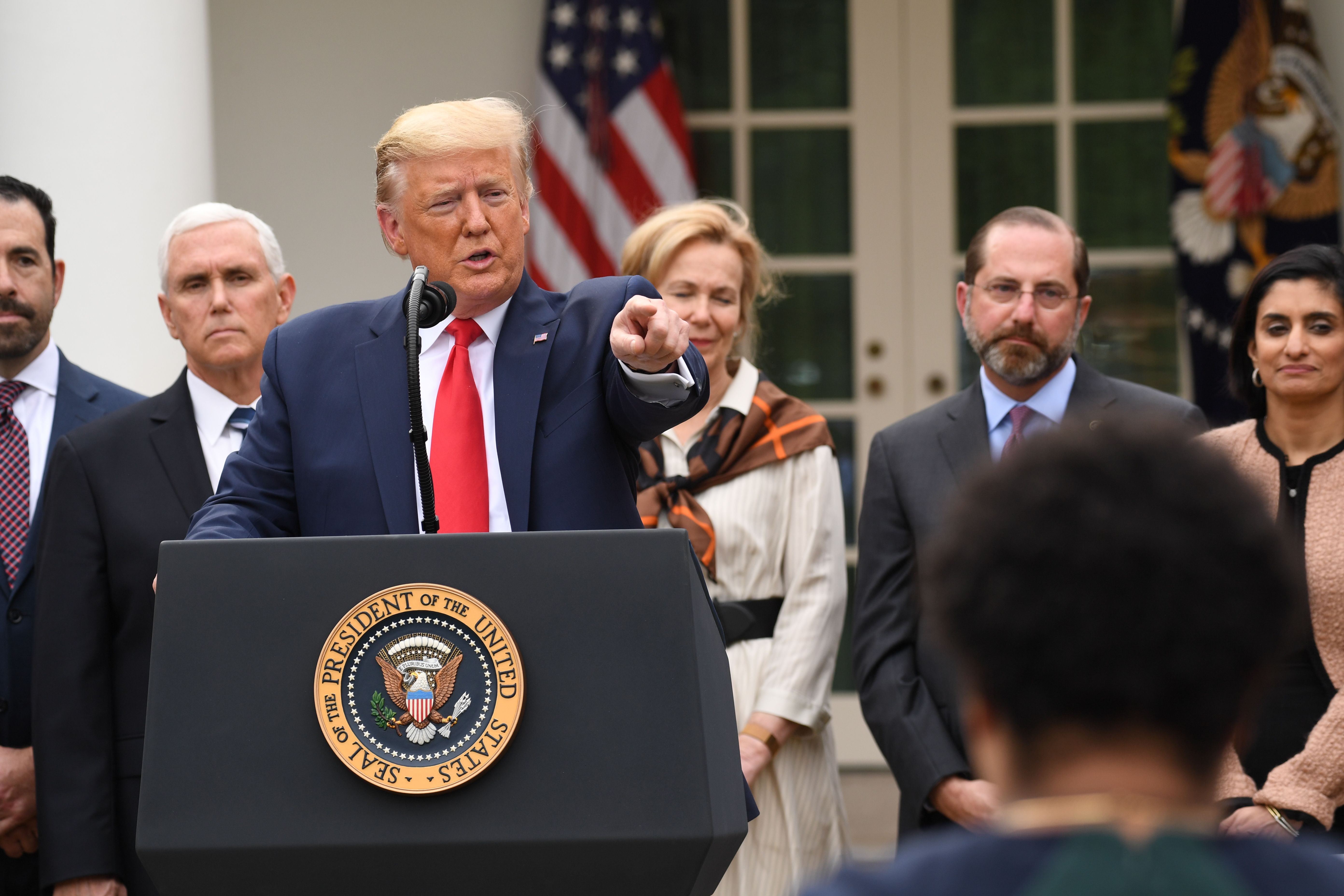 US President Donald Trump takes questions from reporters at a news conference about COVID-19, known as the coronavirus, in the Rose Garden of the White House in Washington, DC, March 13, 2020. - US President Donald Trump declared the novel coronavirus, COVID-19, a national emergency on March 13, 2020. Photo by SAUL LOEB/AFP via Getty Images