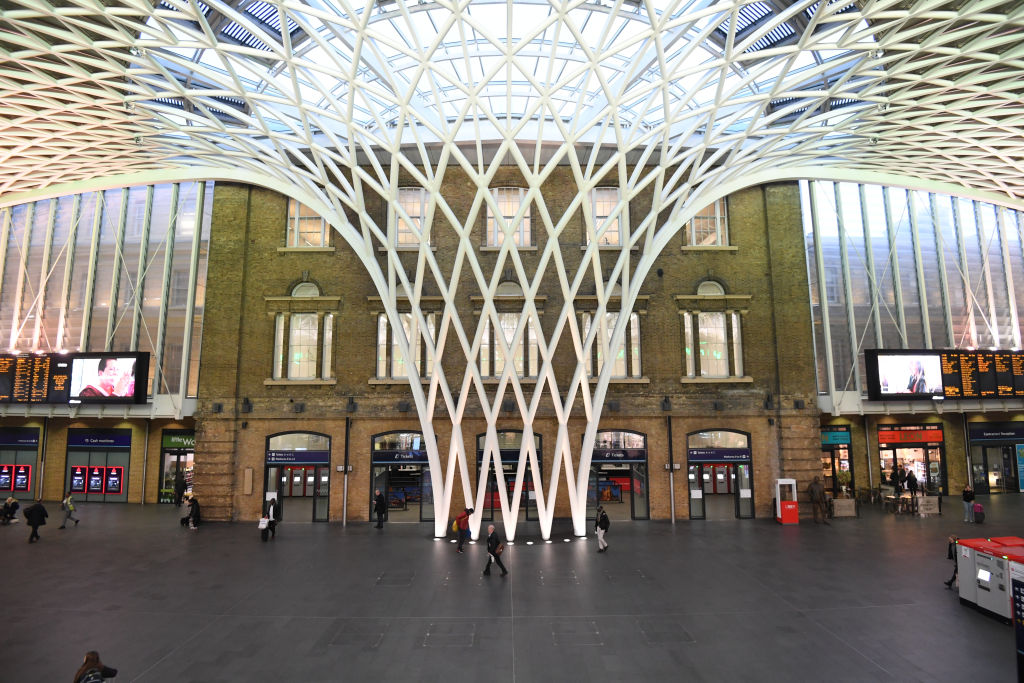 King's Cross station looking empty in London, the day after Prime Minister Boris Johnson called on people to stay away from pubs, clubs and theatres, work from home if possible and avoid all non-essential contacts and travel in order to reduce the impact of the coronavirus pandemic. (Photo by Kirsty O' Connor/PA Images via Getty Images)