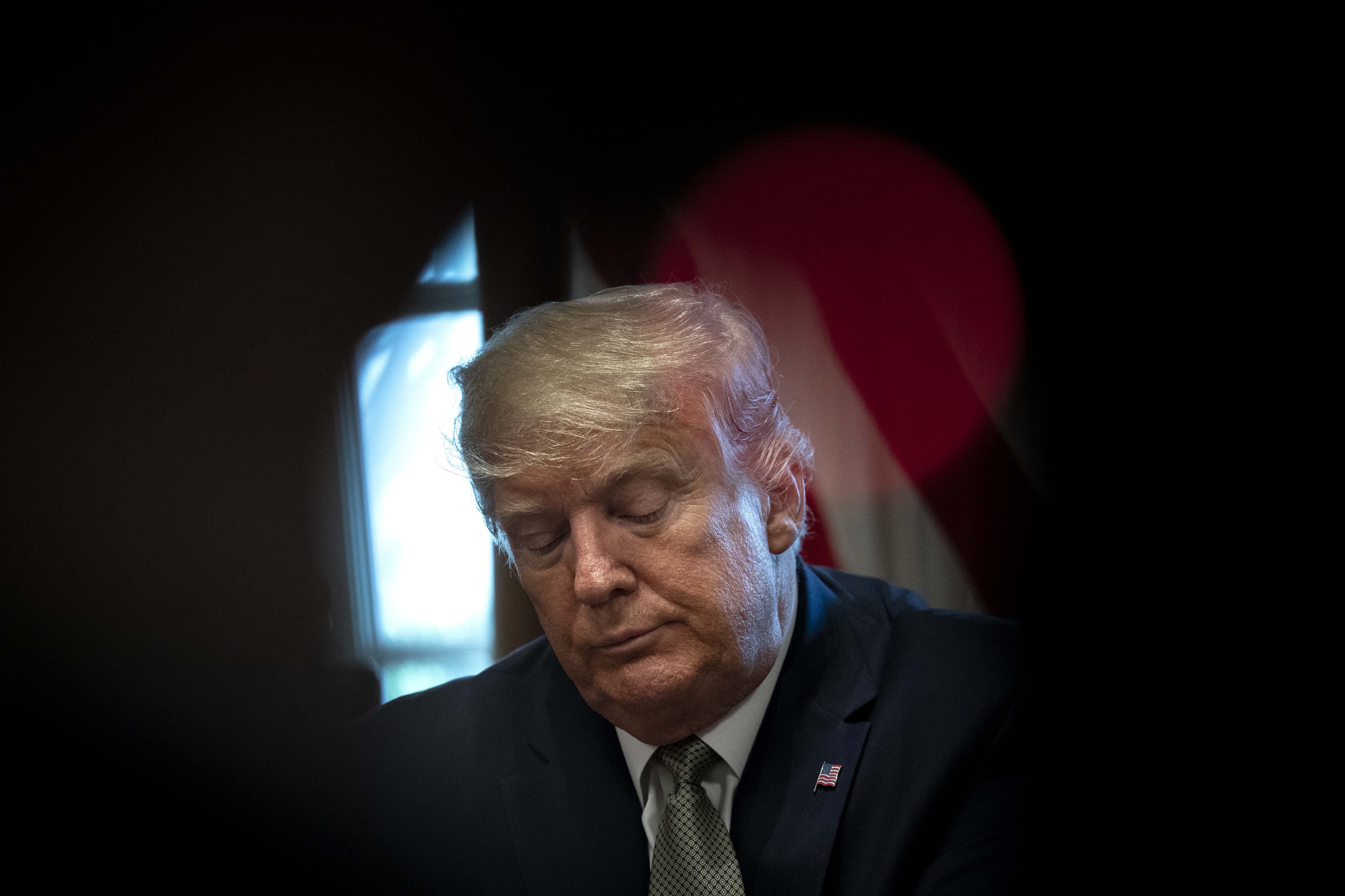 U.S. President Donald Trump leads a meeting with travel and tourism industry executives to discuss economic response to the coronavirus outbreak in the Cabinet Room of the White House on March 17, 2020 in Washington, DC. The Trump administration is considering a stimulus package that could top $1 trillion to counter the economic fallout as the coronavirus spreads. Wire photography: Drew Angerer—Getty Images