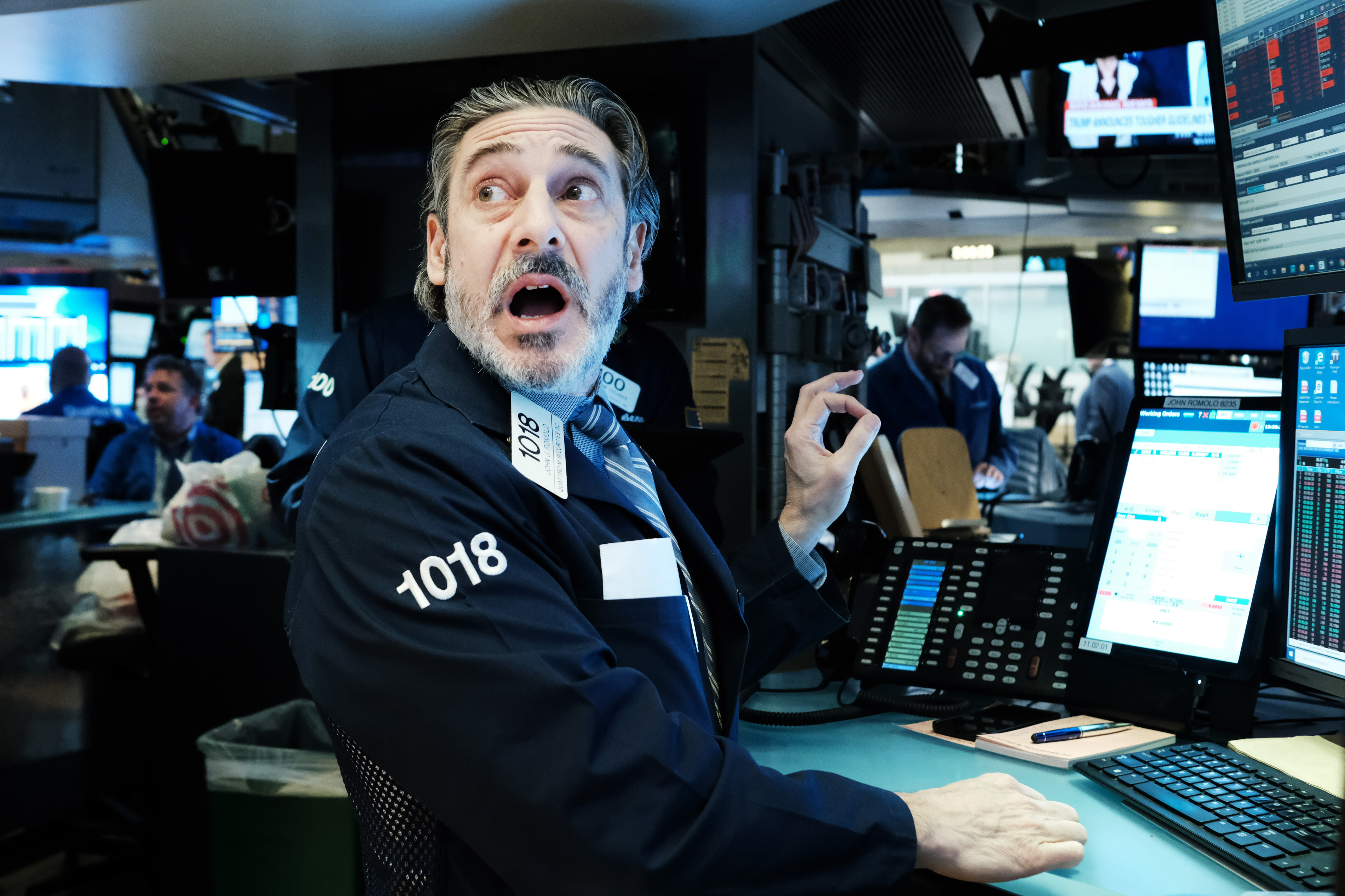Traders work on the floor of the New York Stock Exchange (NYSE) on March 16, 2020 in New York City. Stocks fell sharply on Wall Street on Monday despite a drop in interest rates as the nation grapples with the spreading coronavirus outbreak. Wire photography: Spencer Platt—Getty Images