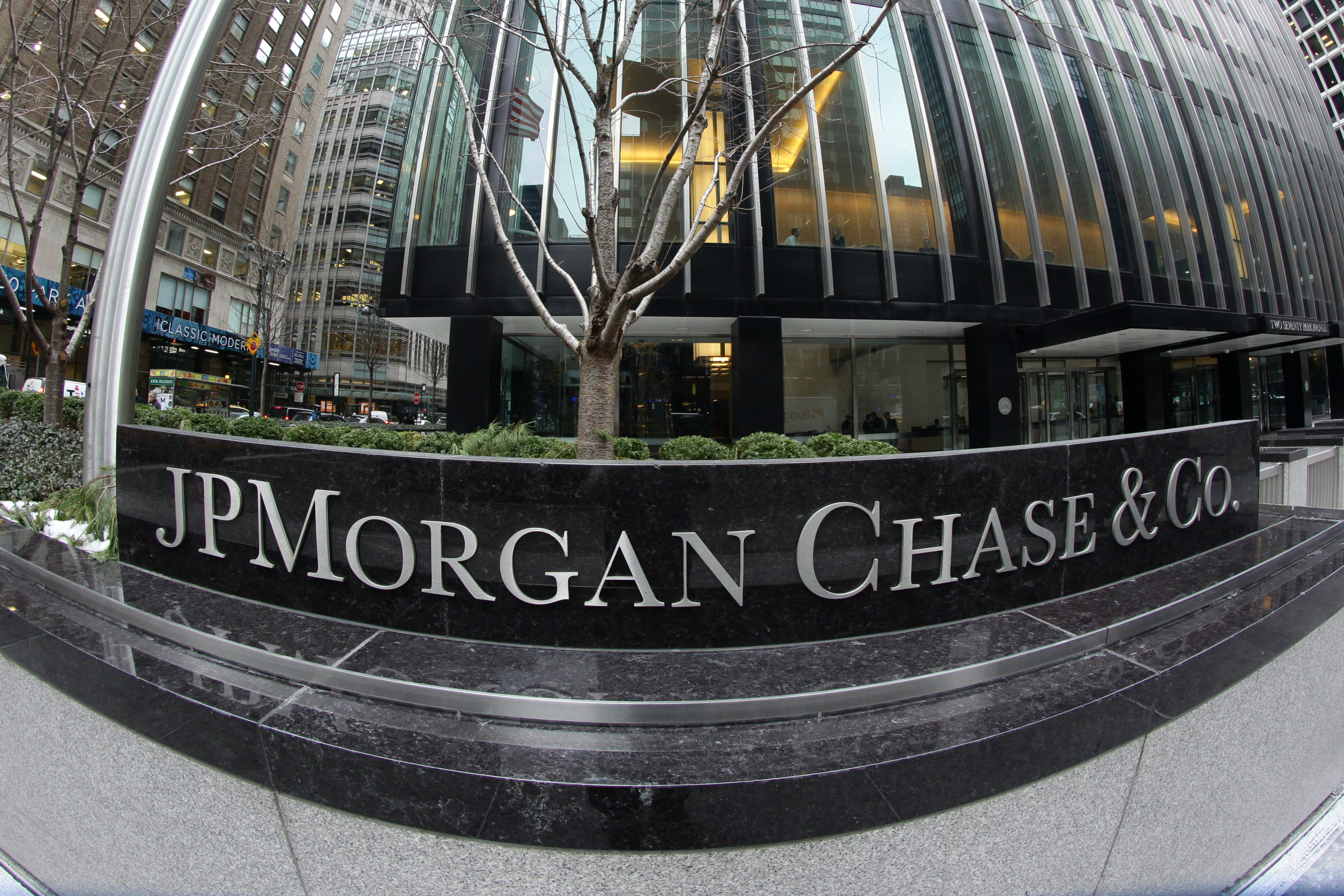 The JP Morgan Chase & Co. headquarters, The JP Morgan Chase Tower in Park Avenue, Midtown, Manhattan, New York. JPMorgan Chase & Co. is an American multinational banking and financial services holding company. It is the largest bank in the United States. Manhattan, New York, USA. 27th January 2014. Photo Tim Clayton (Photo by Tim Clayton/Corbis via Getty Images)