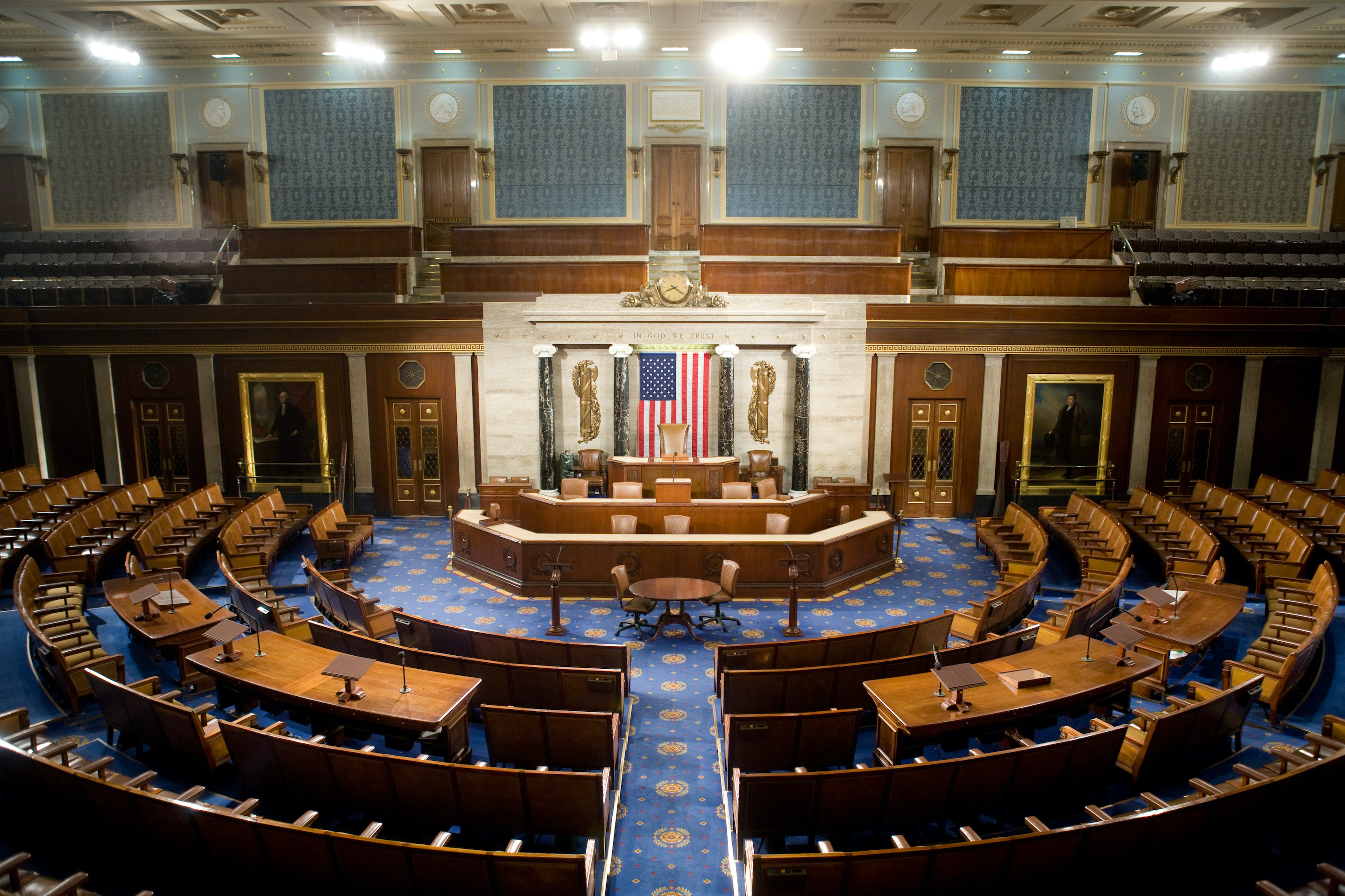 The U.S. House of Representatives chamber is seen Dec. 8, 2008, in Washington, D.C. As the coronavirus rages, the U.S. Congress—both the House and Senate—could use remote voting to pass laws, if only Nancy Pelosi and Mitch McConnell offered them a chance to change the rules. Photo by Brendan Hoffman/Getty Images