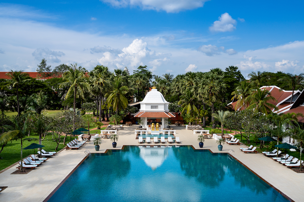 With 15 acres of gardens and Cambodia's largest and most iconic swimming pool, the Raffles Grand Hotel d'Angkor offers an ideal base from which to explore Siem Reap and the nearby Angkor UNESCO World Heritage Site.