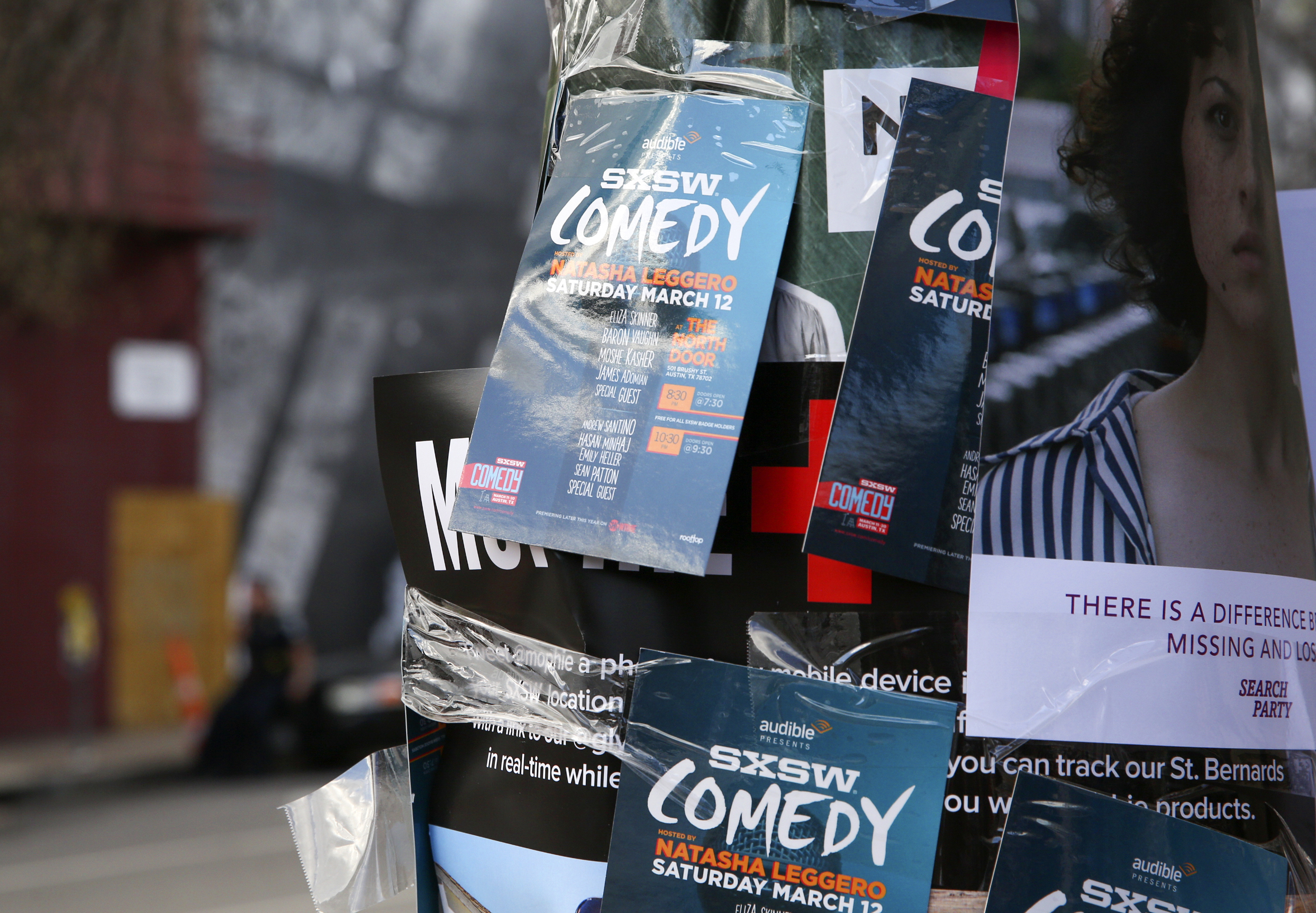 Flyers advertising comedy on a light pole on Sixth Street during South By Southwest in 2016. Austin city officials canceled the South by Southwest arts and technology festival, but will still go ahead with film awards. Rich Fury—Invision/AP Images