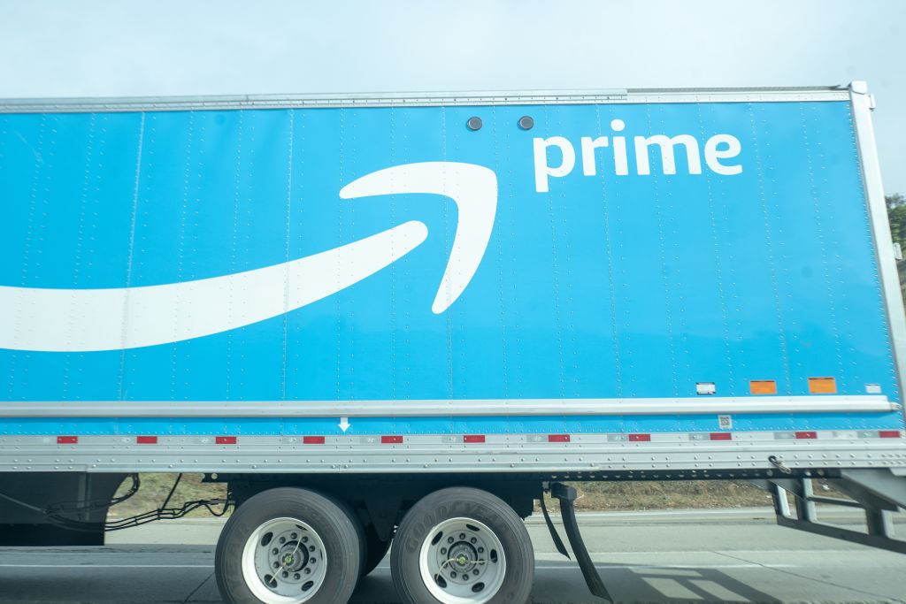 View of rear section of Amazon Prime semi truck, delivering packages for ecommerce company Amazon, on the 680 Freeway in Sunol, California, December 12, 2019. (Photo by Smith Collection/Gado/Getty Images)