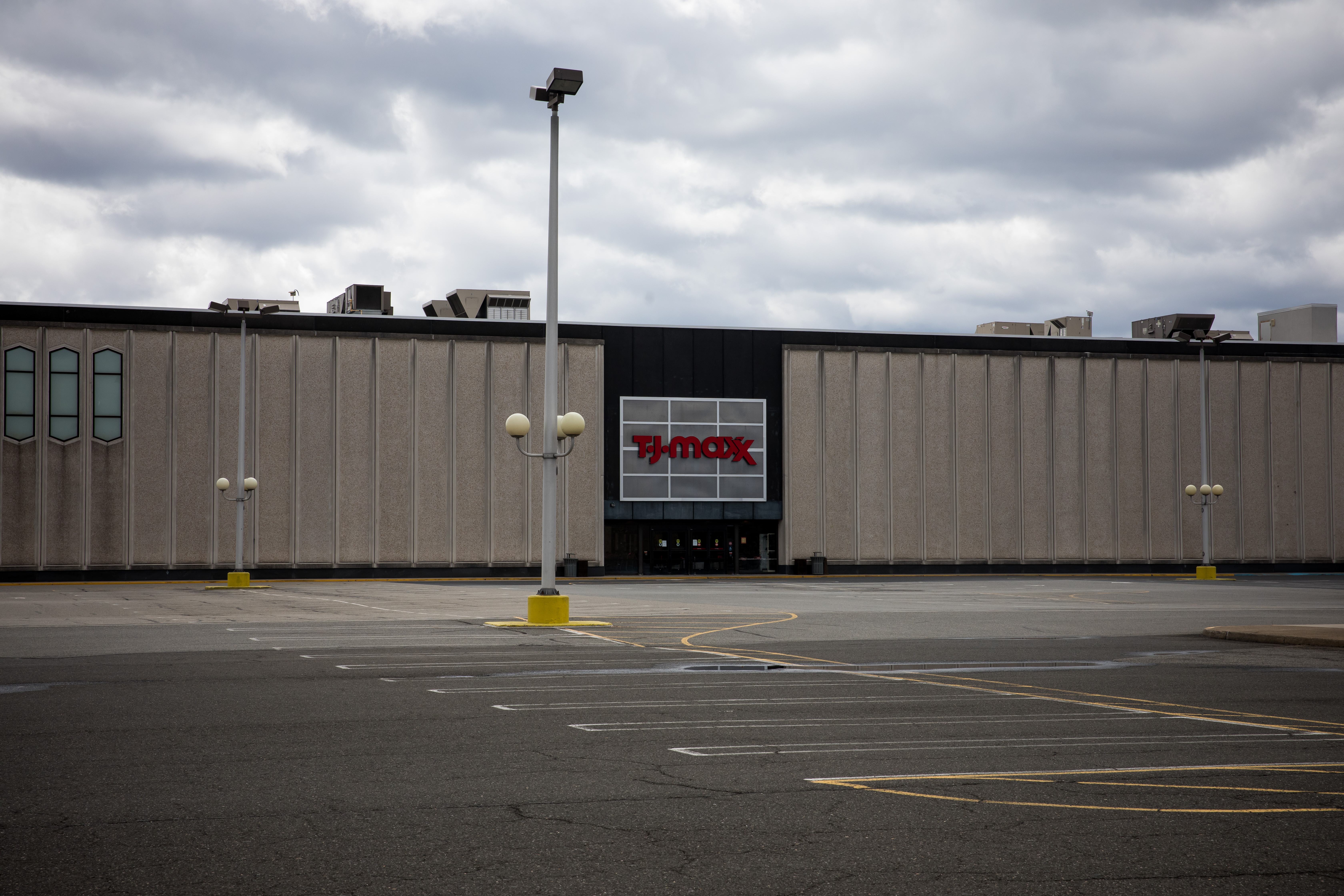 The parking lot of a TJ Maxx is seen empty in Paramus, New Jersey, U.S., on Friday, April 10, 2020. Huge daily infection spikes are slowing in Bergen County, with New Jersey's most Covid-19 cases, another big sign that the curve is flattening, Governor Phil Murphy said. Photographer: Michael Nagle/Bloomberg via Getty Images