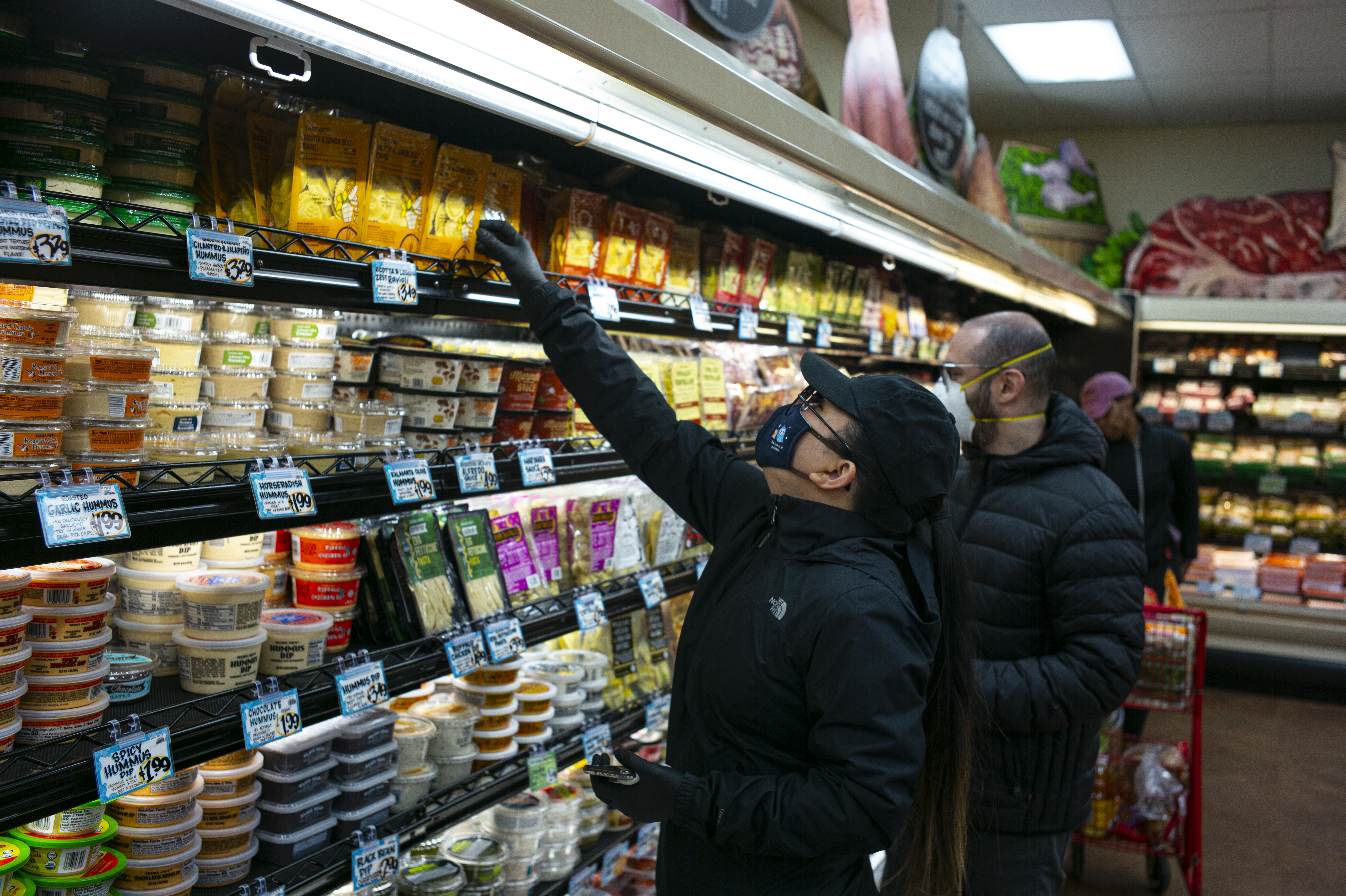 Shoppers at a Trader Joe’s in Brooklyn, on March 28, 2020. The store lets in a limited number of shoppers at one time, owing to the spreading coronavirus.  Robert Nickelsberg—Getty Images