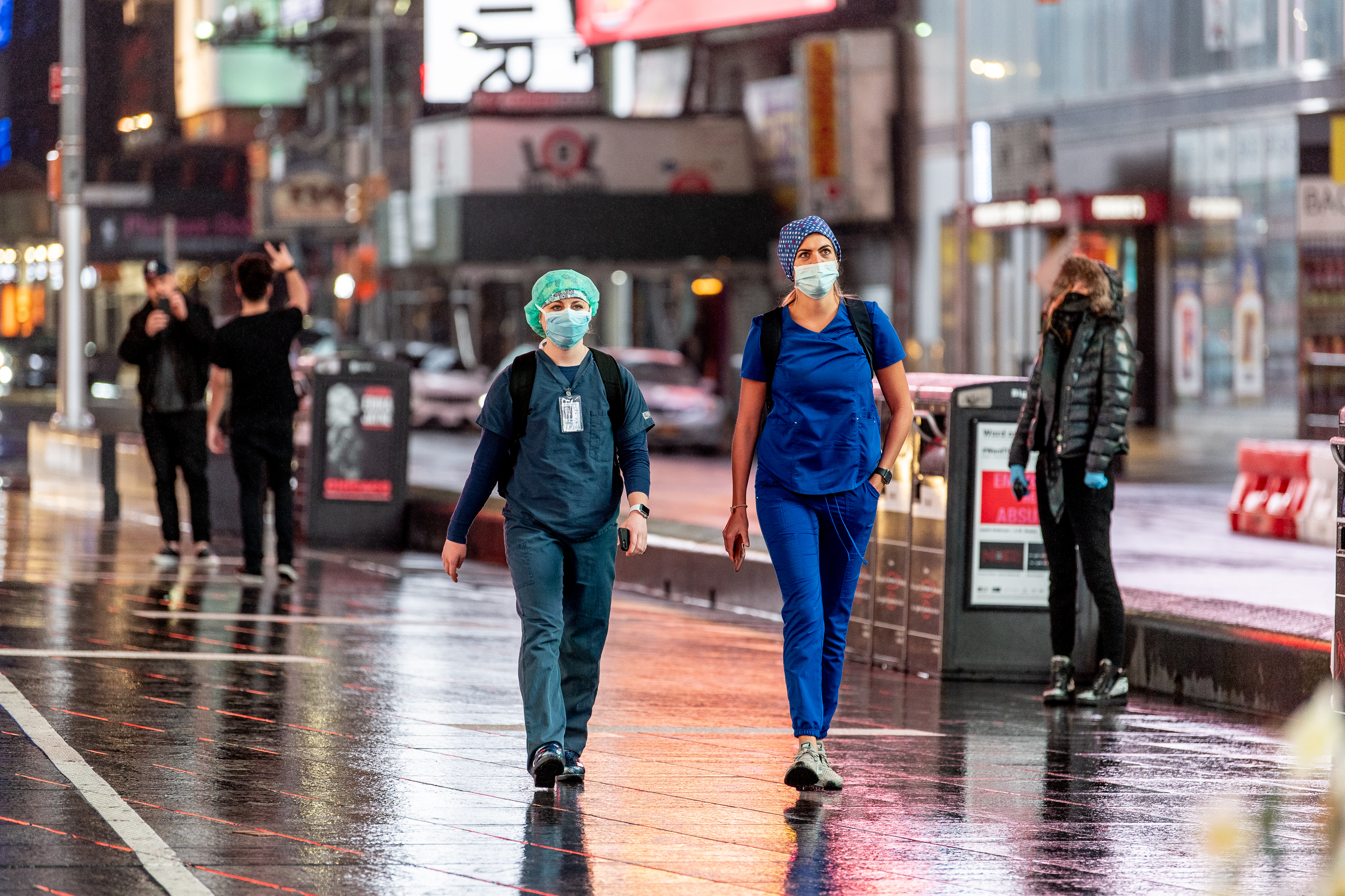 Medical workers wear masks in Times Square during the the COVID-19 shutdown on April 26, 2020 in New York City. Roy Rochlin—Getty Images