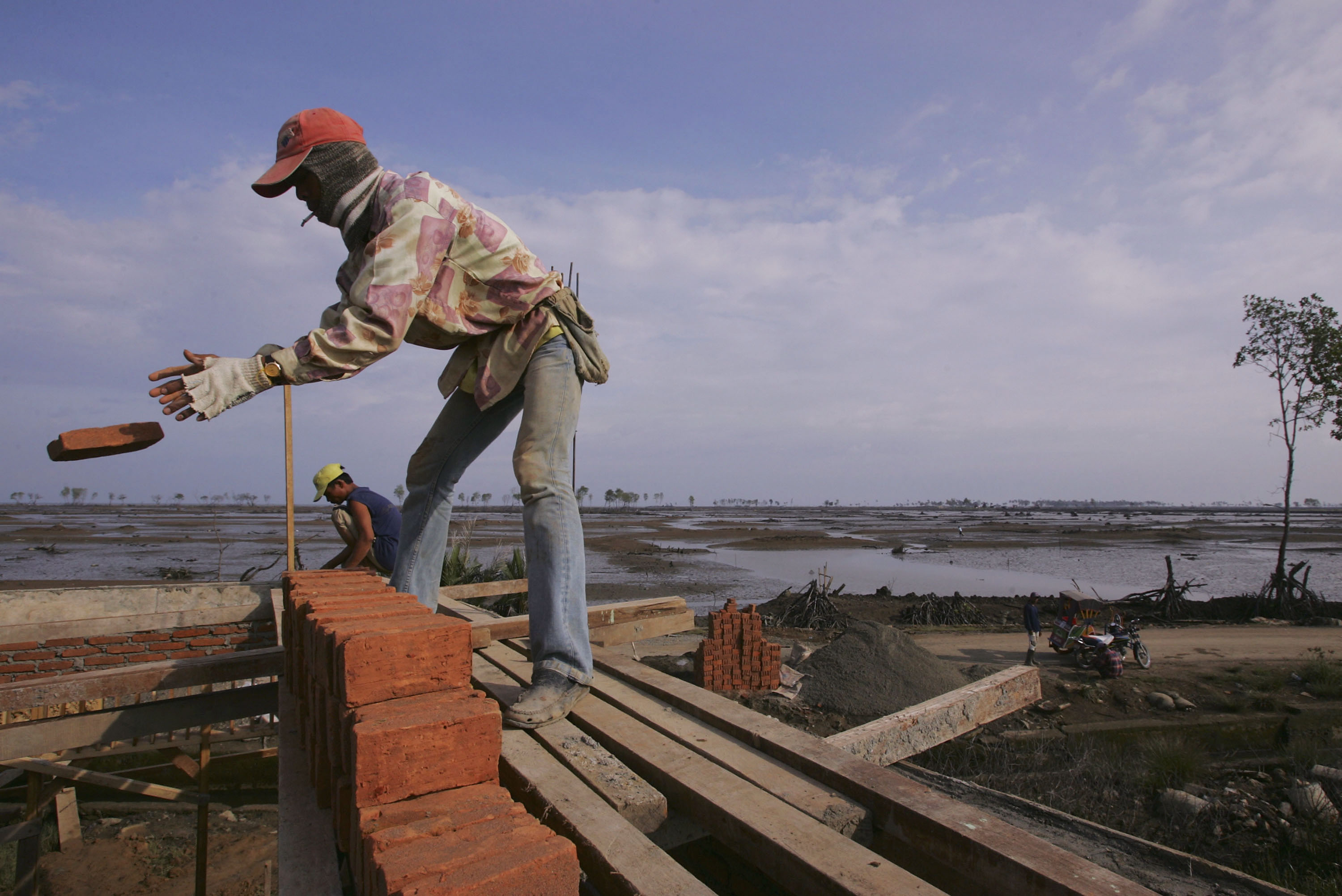 construction worker rebuilding in Bandeh aceh, indonesia