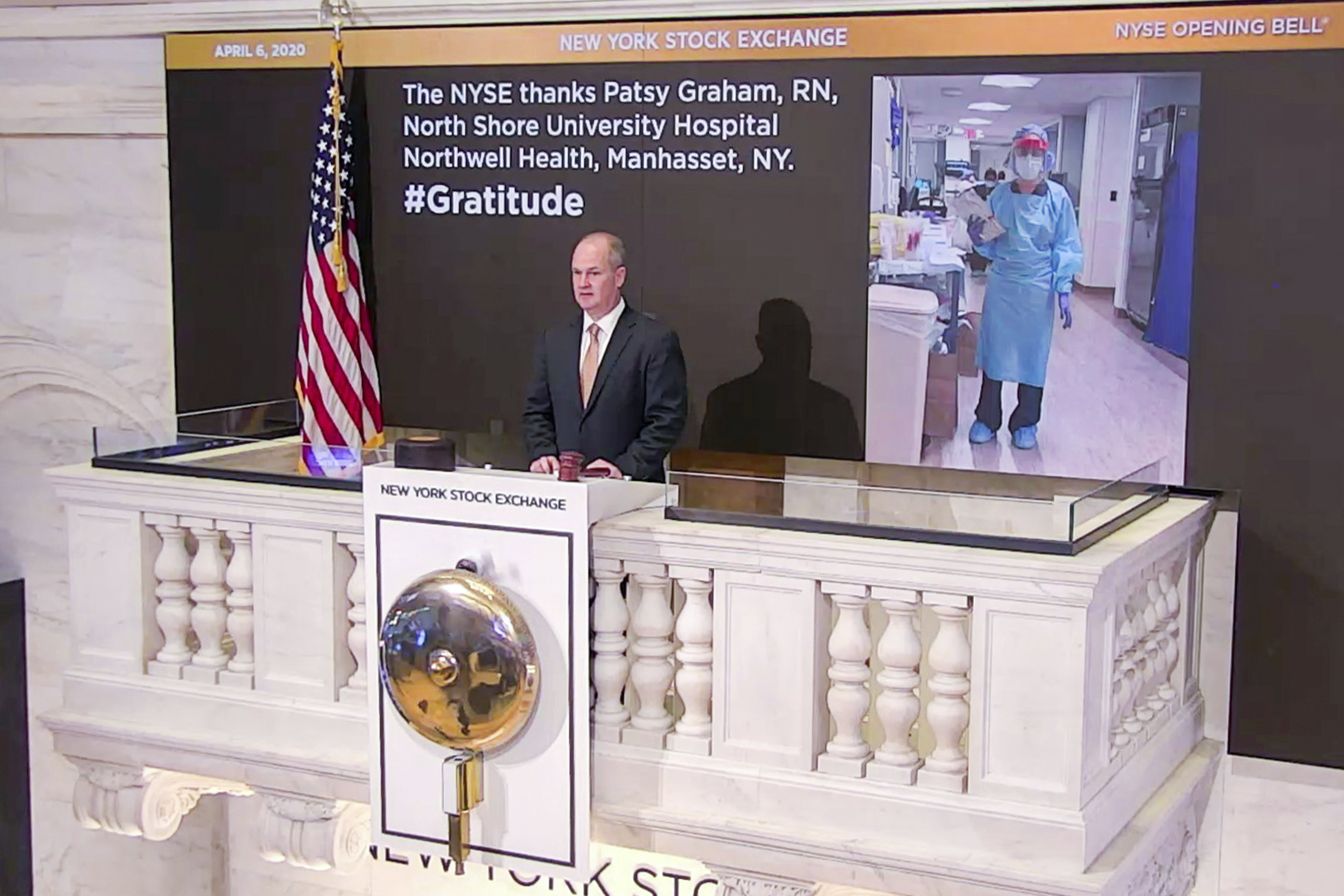 New York Stock Exchange Chief Security Officer Kevin Fitzgibbons rings the opening bell on Monday, April 6, 2020.