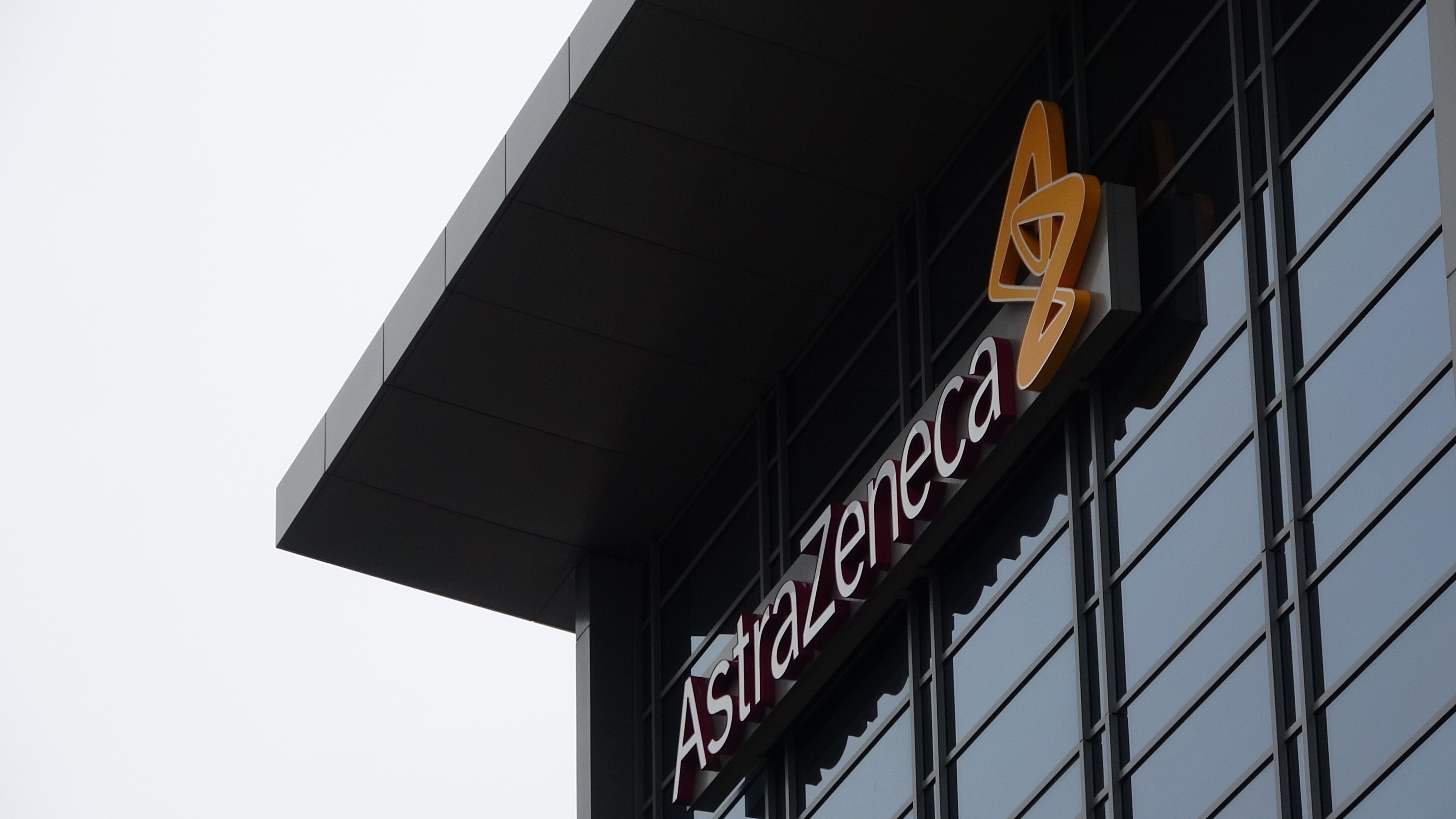 Facade with logo at office of pharmaceutical company AstaZeneca. The U.K. pharm giant will get $1 billion from the United States to scale up production of an experimental Covid-19 vaccine being developed in the labs at University of Oxford. Wire photography: Smith Collection—Gado/Getty Images