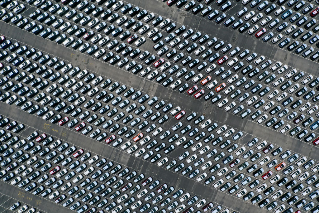 RICHMOND, CALIFORNIA - APRIL 30: In this aerial photo from a drone, brand new Subaru cars sit in an Auto Warehouse Co. storage lot on April 30, 2020 in Richmond, California. As people continue to shelter in place across the United States due to coronavirus (COVID-19), new car sales have plummeted over 50% from April 2019, and an over 35% decrease since March 2020. (Photo by Justin Sullivan/Getty Images)
