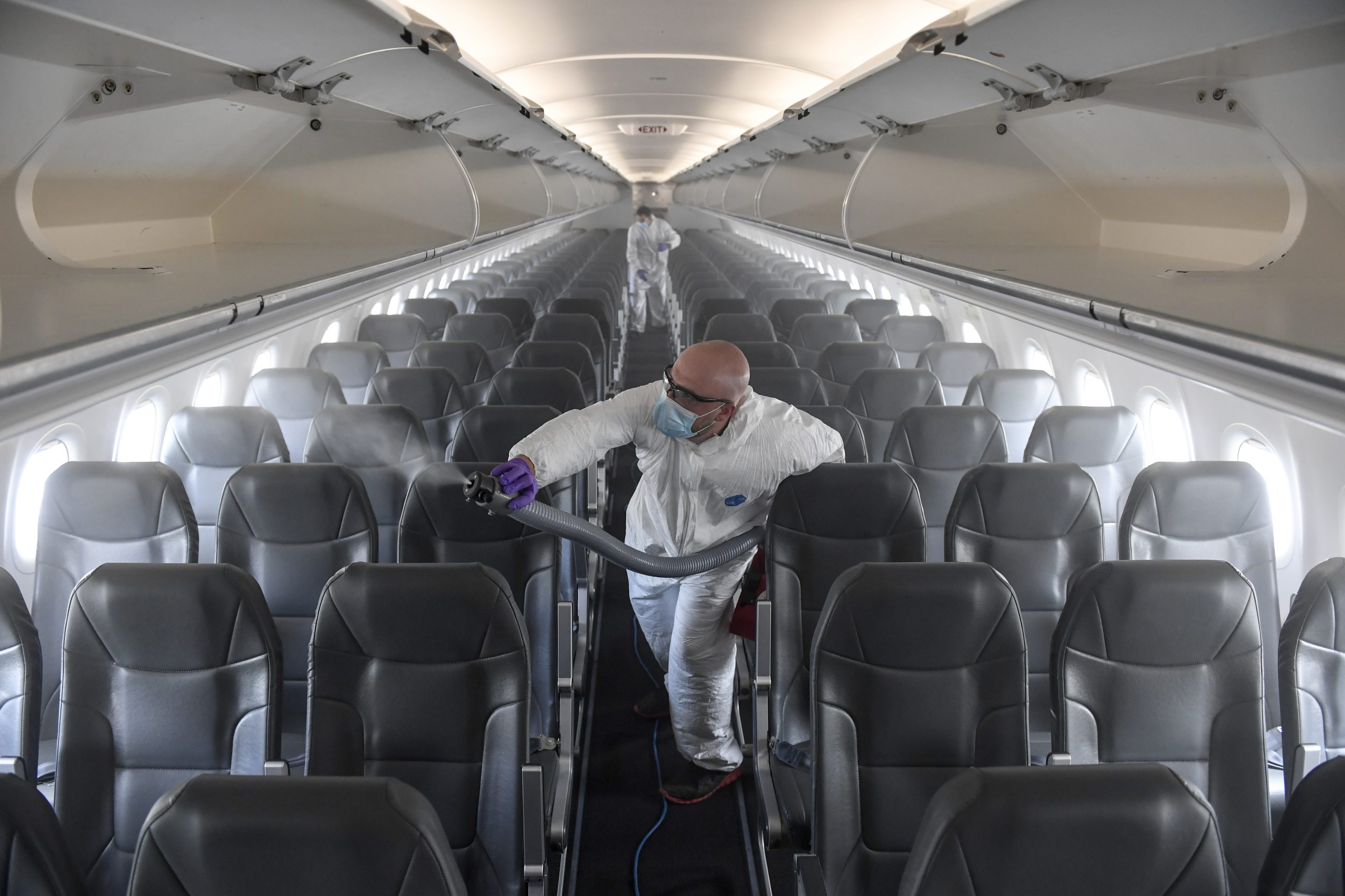 DENVER, CO - MAY 6: Brandon Wilson, owner of AvidJet, disinfects a Frontier airplane with a fogger at Denver International Airport on Tuesday, May 6, 2020. ProShield, the microbiostatic agent used to disinfect the plane, will keep the aircraft clean for up to 90 days after application. Beginning this week, Frontier will require the use of masks by passengers and will implement temperature checks in the coming weeks. (Photo by AAron Ontiveroz/MediaNews Group/The Denver Post via Getty Images)