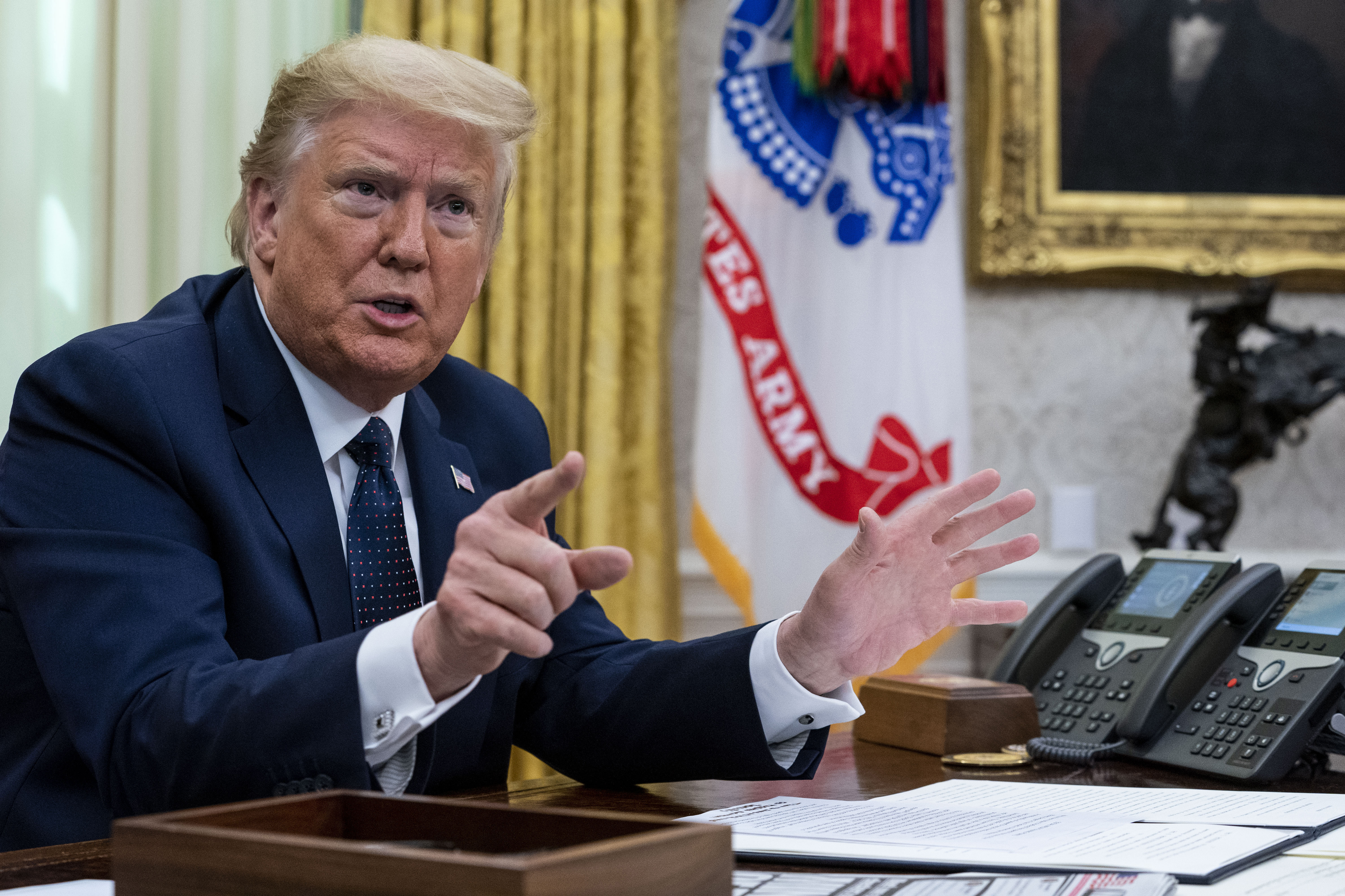 President Donald Trump speaks in the Oval Office before signing an executive order related to regulating social media on May 28, 2020 in Washington, DC. Trump's executive order could lead to attempts to punish companies such as Twitter and Google for attempting to point out factual inconsistencies in social media posts by politicians. Doug Mills—Pool/Getty Images