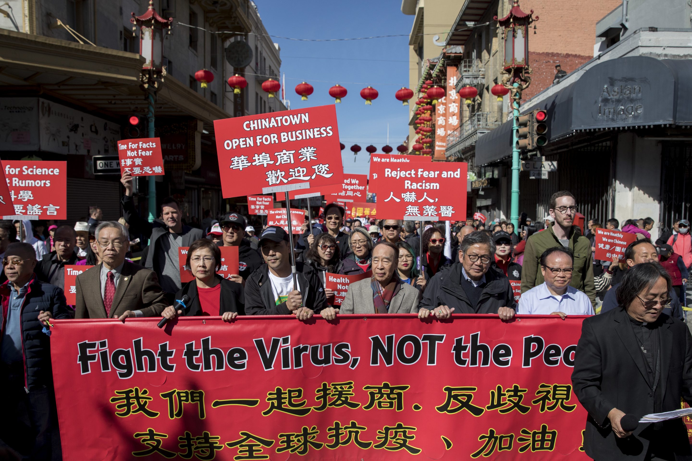SAN FRANCISCO CA - FEBRUARY 29: Hundreds of Chinatown residents along with local and state officials take to the streets protest against racism against the Chinese community during a march down Grant Avenue from Chinatown's Portsmouth Square to Union Square in San Francisco, Calif. Saturday, February 29, 2020. Racism against the Chinese community has increased since the discovery of the first coronavirus outbreak in Wuhan, China has spread globally. (Jessica Christian/The San Francisco Chronicle via Getty Images)