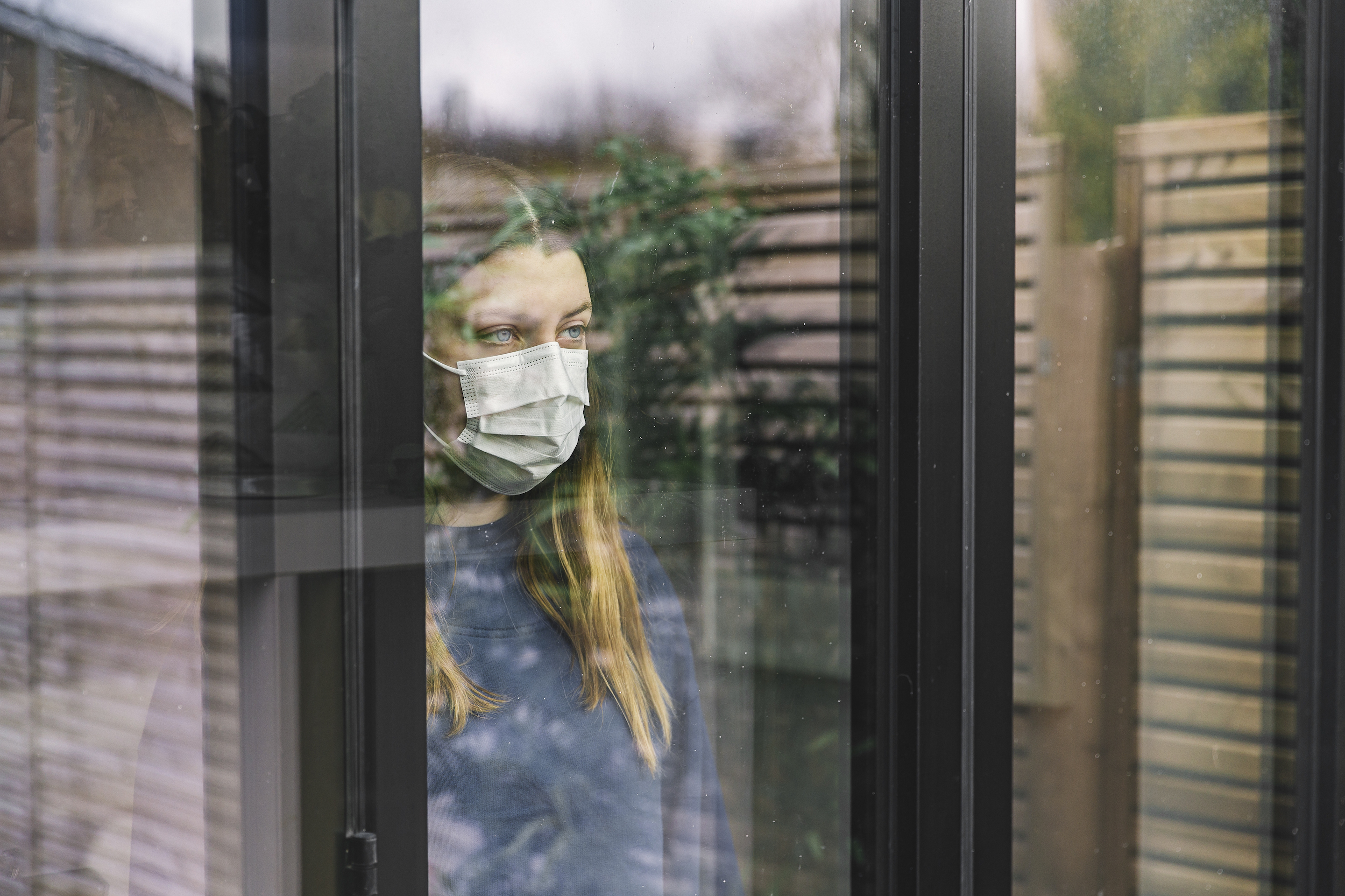 sad woman with mask