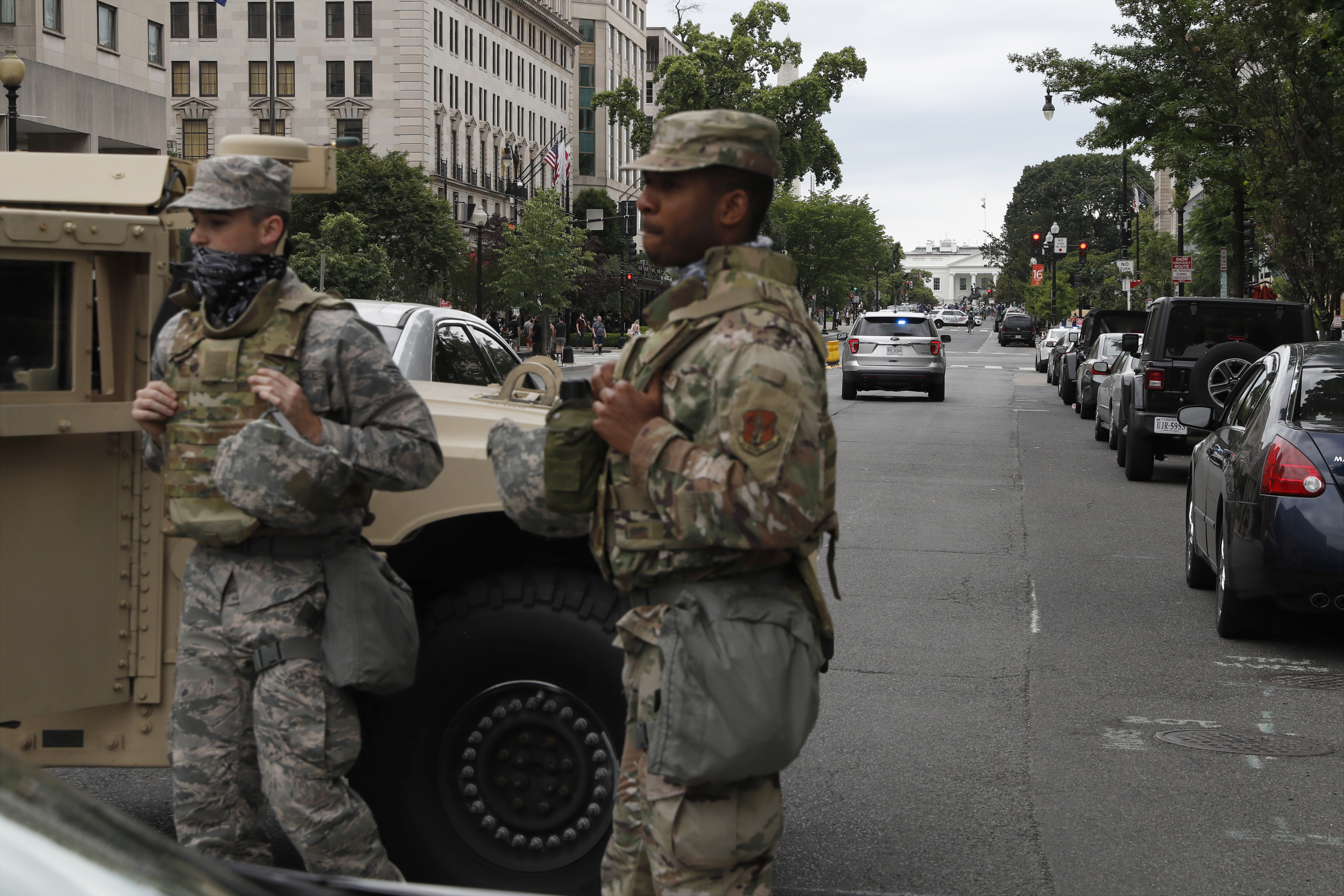 Members of the DC National Guard block an intersection on 16th Street as demonstrators gather to protest the death of George Floyd, Tuesday, June 2, 2020, near the White House in Washington. Floyd died after being restrained by Minneapolis police officers. Jacquelyn Martin—AP Photo
