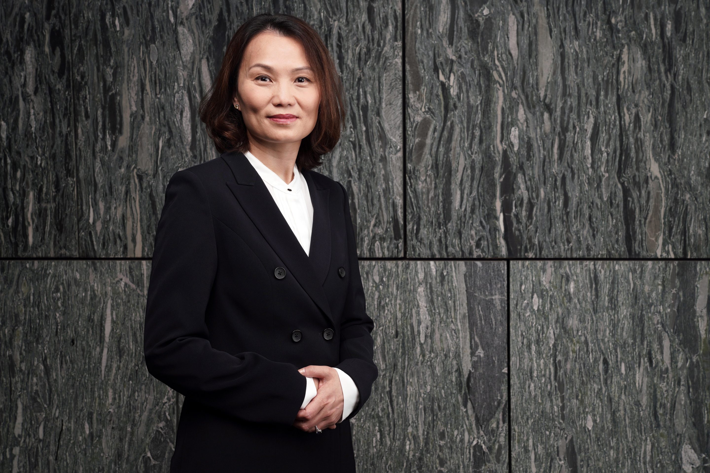 Joey Wat, chief executive officer of Yum China Holdings Inc., poses for a photograph at the Bloomberg Invest Asia forum in Hong Kong, China, on Thursday, March 21, 2019. The forum brings together some of the biggest businesses and influential institutions. Photographer: Anthony Kwan/Bloomberg via Getty Images