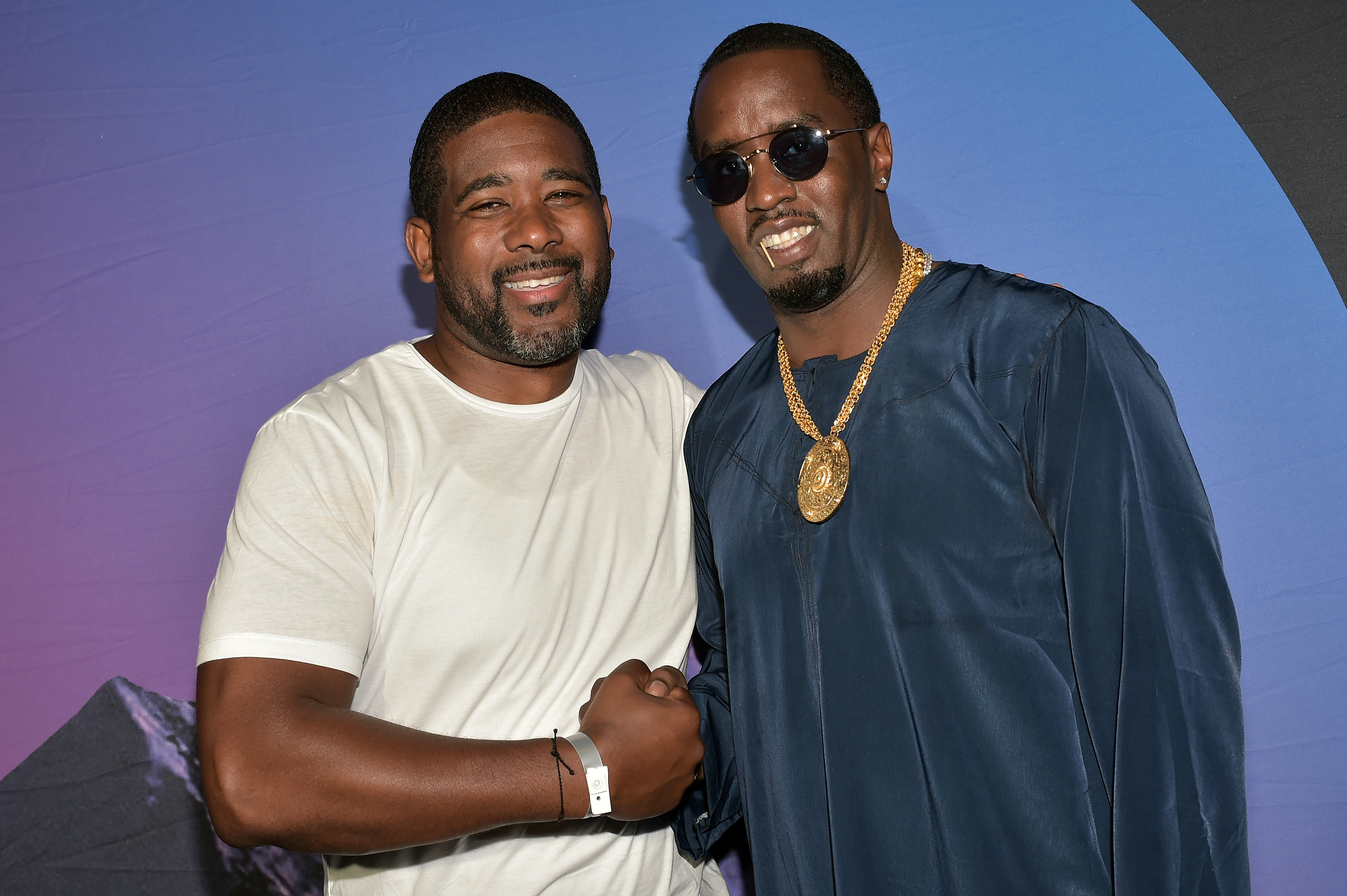 Combs Enterprises COO Tarik Brooks (left) and Sean “Diddy” Combs attend day three of REVOLT Summit x AT&T on Sept. 14, 2019, in Atlanta. Moses Robinson—Getty Images for Revolt