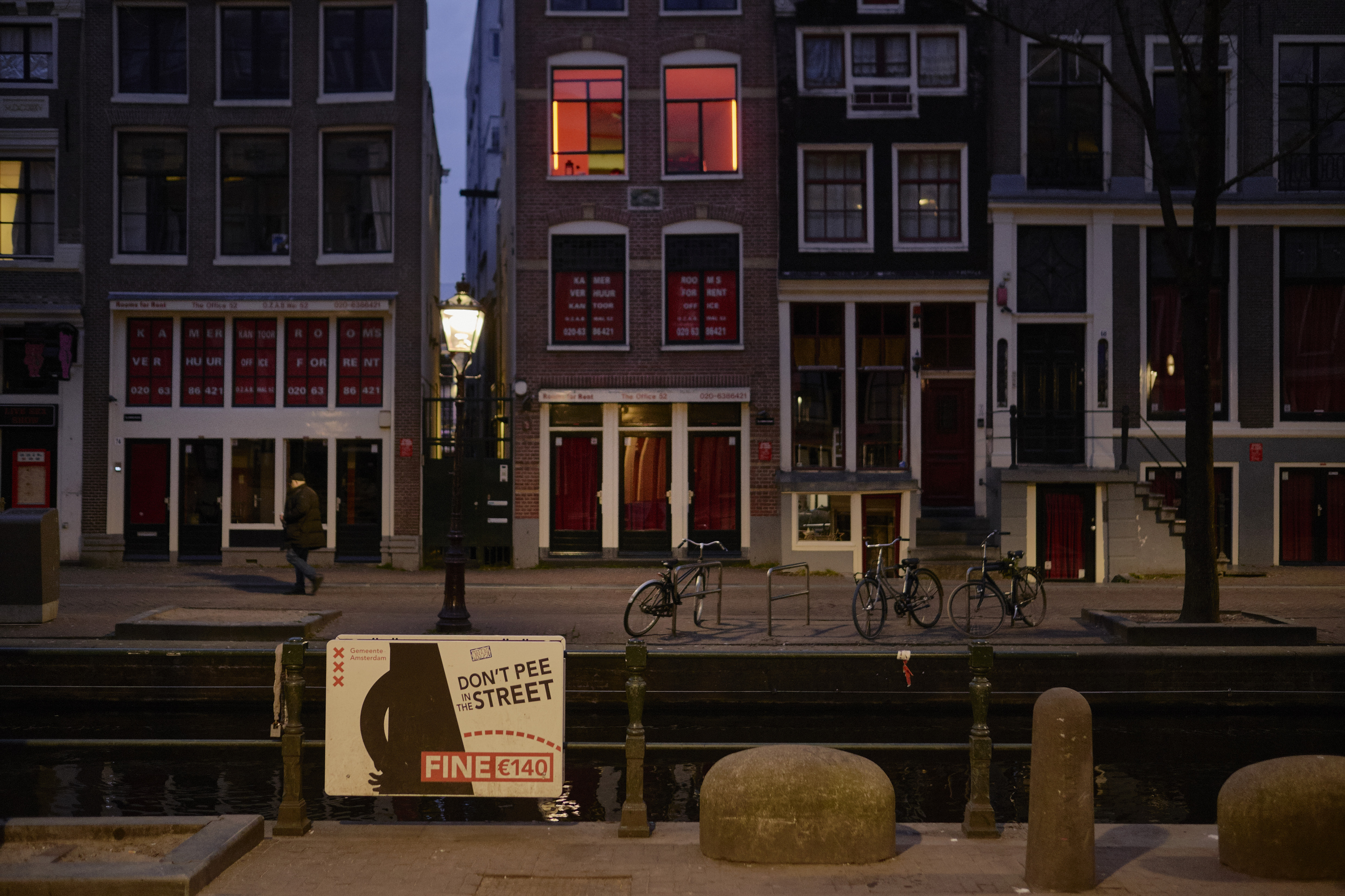 Amsterdam's Red Light District has been closed and empty of tourists amid the coronavirus pandemic for the past two months, giving locals the opportunity to rethink the tourist hotspot as it begins to reopen. Wire photography: Pierre Crom—Getty Images