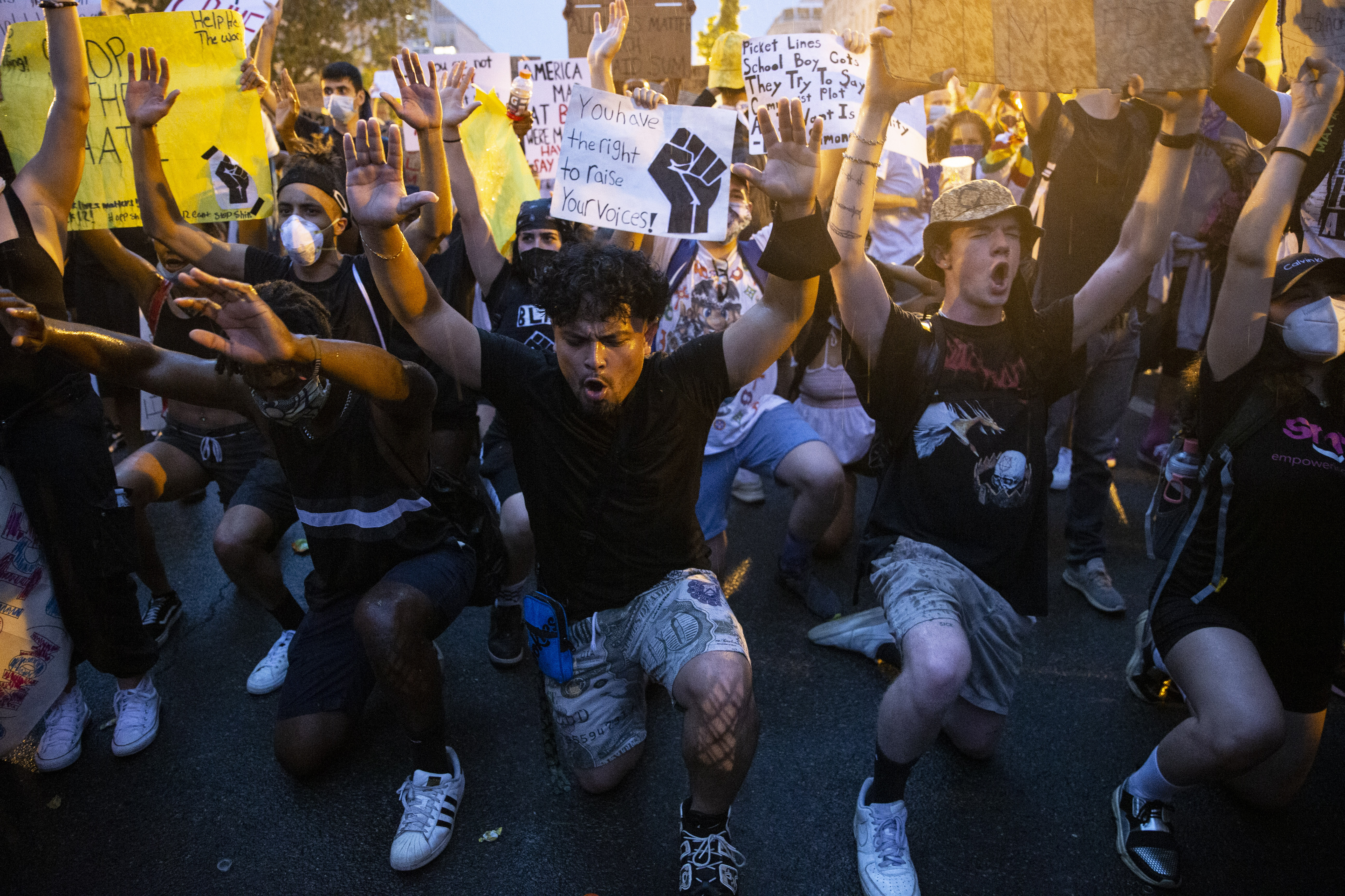 People gather in the rain outside of the White House for a peaceful protest against police brutality on June 4, 2020 in Washington, DC.