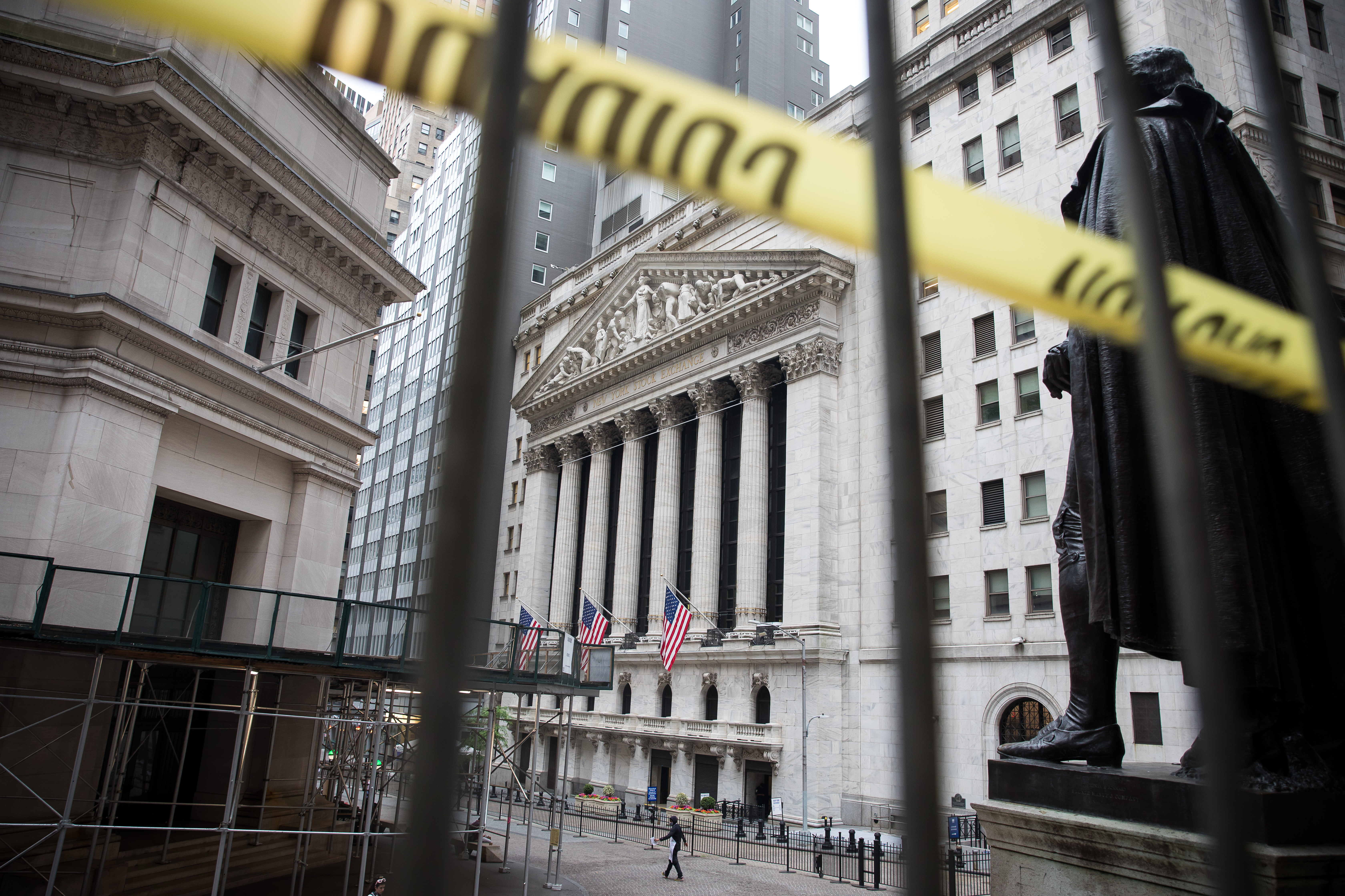 A pedestrian passes in front of the New York Stock Exchange in New York. The two-month rally in U.S. stocks puts equities in a bull market, Morgan Stanley says, but a host of factors could limit further growth. Wire photography: Michael Nagle—Bloomberg via Getty Images