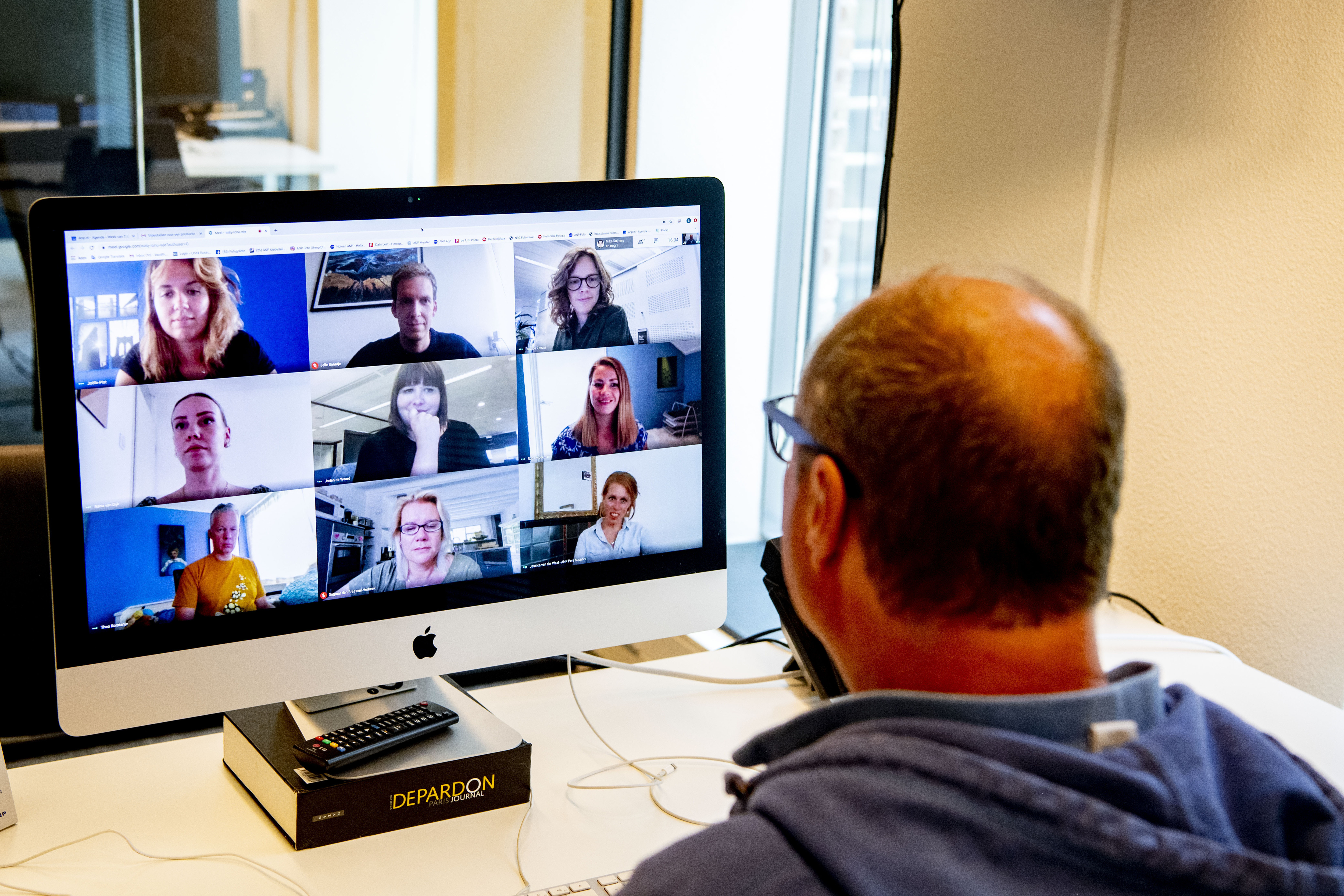 THE HAGUE, NETHERLANDS - 2020/06/12: A director is seen having an online meeting with his employees through a laptop on zoom video call app. The Dutch government has ordered all offices to be closed until further notice in attempt to control the spread of the COVID-19 Coronavirus. (Photo by Robin Utrecht/SOPA Images/LightRocket via Getty Images)