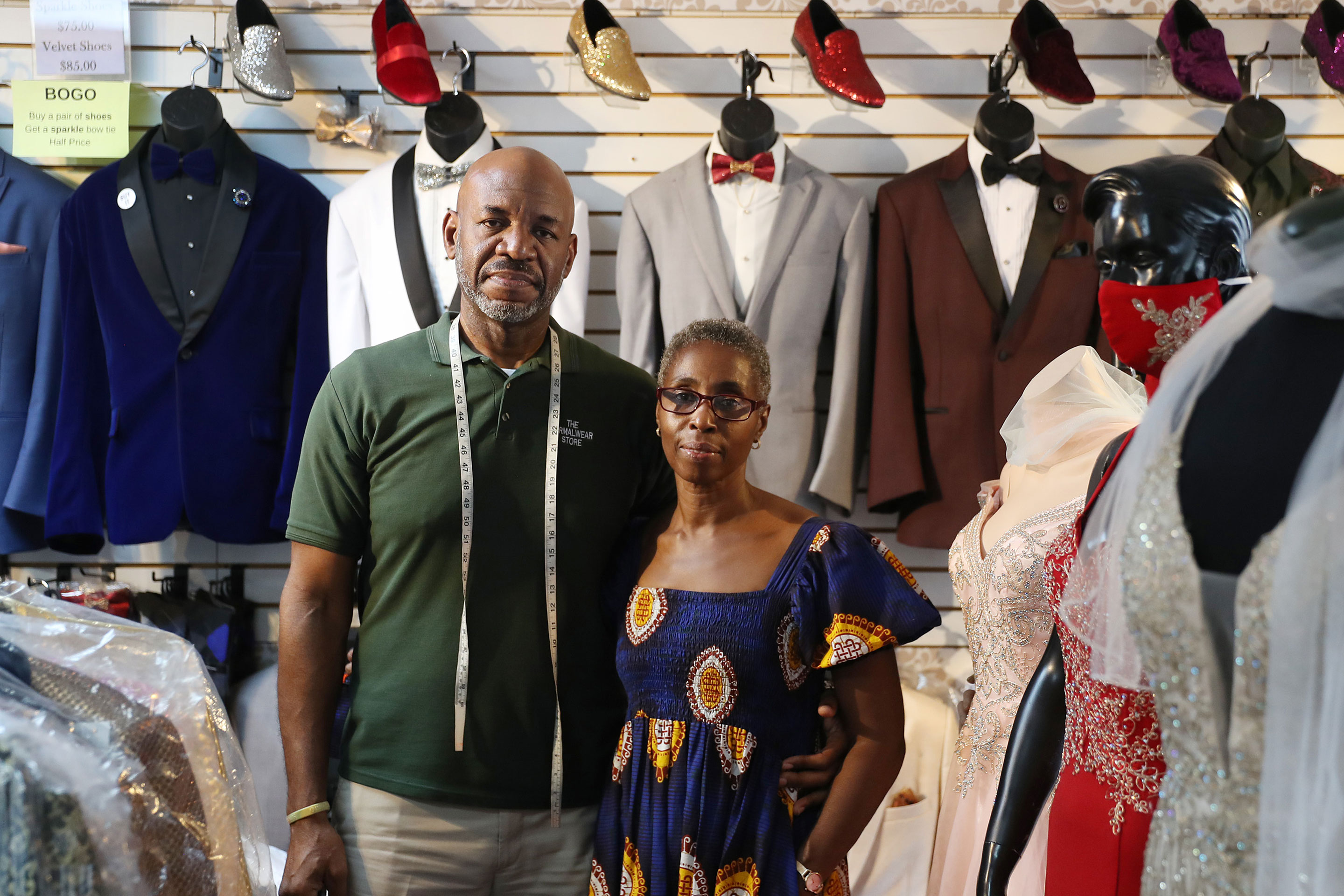 James Robinson and his wife Perlina Robinson pose for a portrait in The Formalwear store on Blackout Day 2020 on July 07, 2020 in Miami Gardens, Florida. They have owned the business for the last 22 years. Supporters of Blackout Day have committed to only spending money at black-owned businesses to showcase the economic power of the Black community