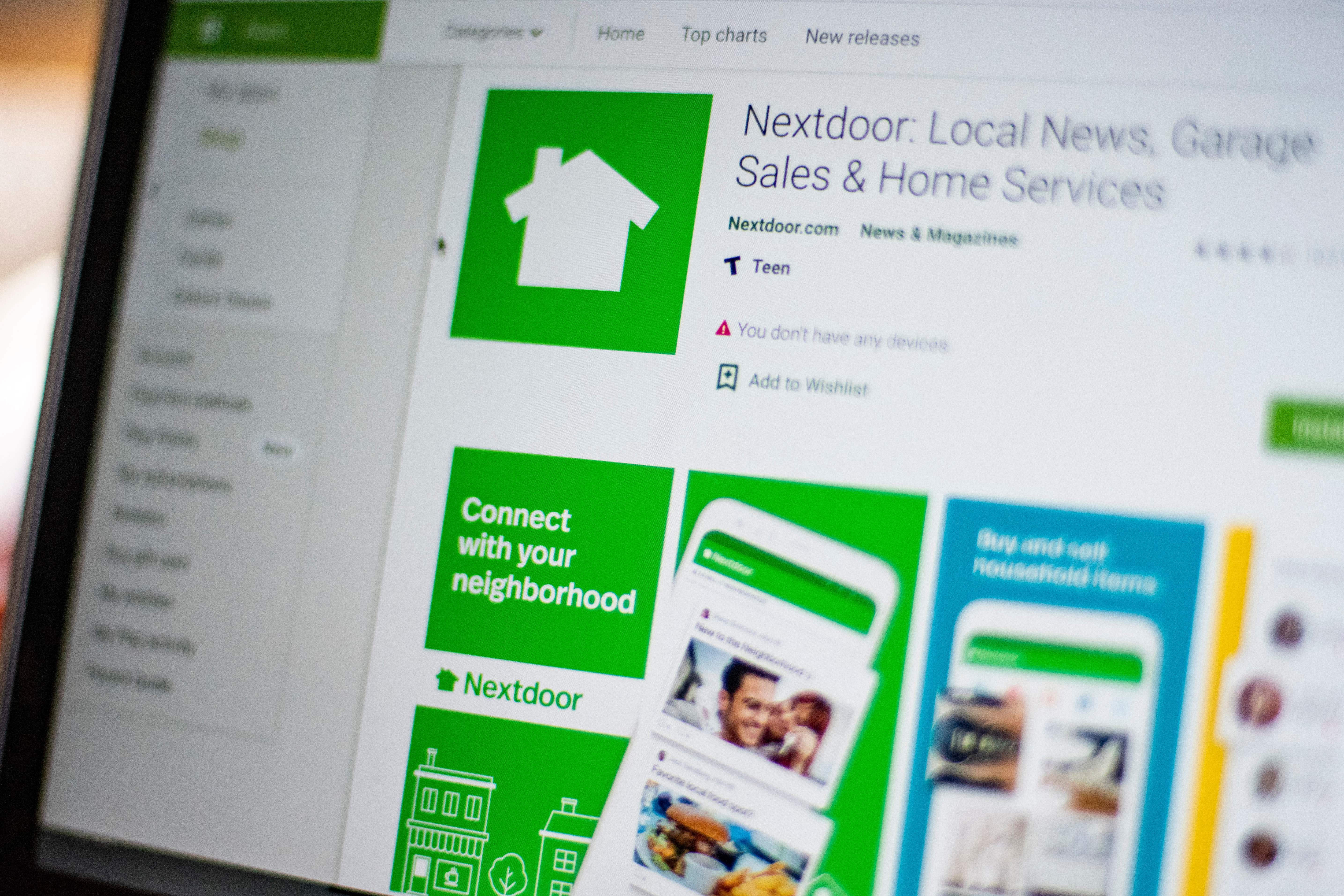 Nextdoor, the hyper local social network, is seen on a computer screen in Washington, DC, on March 27, 2020. - There are offers to pick up groceries or medicine for neighbors, to share supplies, or walk people's dogs. And exchange information on where to find scarce items like toilet paper. For people forced to stay home to ride out the coronavirus pandemic, Nextdoor, the hyperlocal social network, has found itself playing an increasingly important role. (Photo by Eric BARADAT / AFP) (Photo by ERIC BARADAT/AFP via Getty Images)