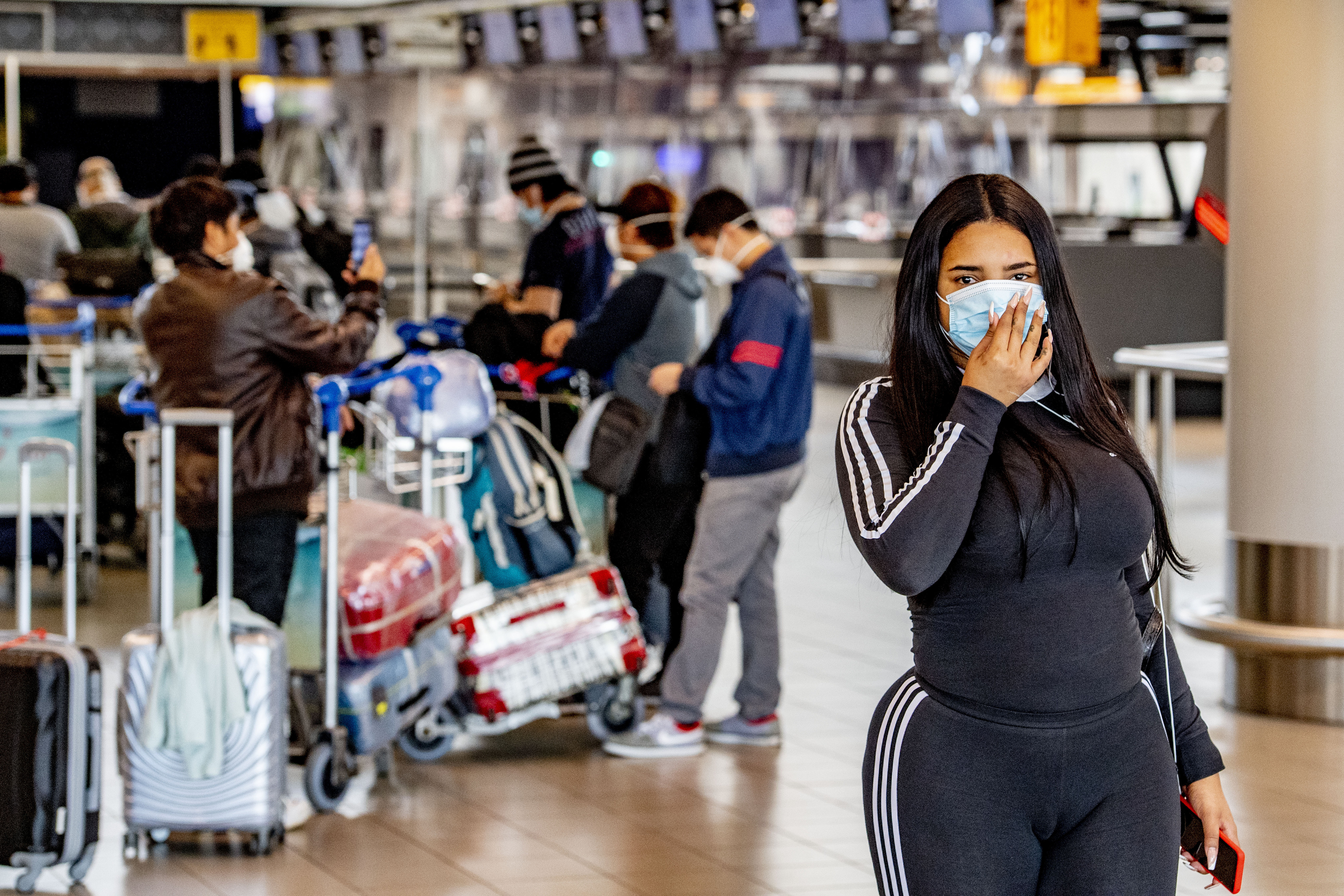 AMSTERDAM, NETHERLANDS - 2020/07/13: A lady wearing a face mask seen at the airport.
