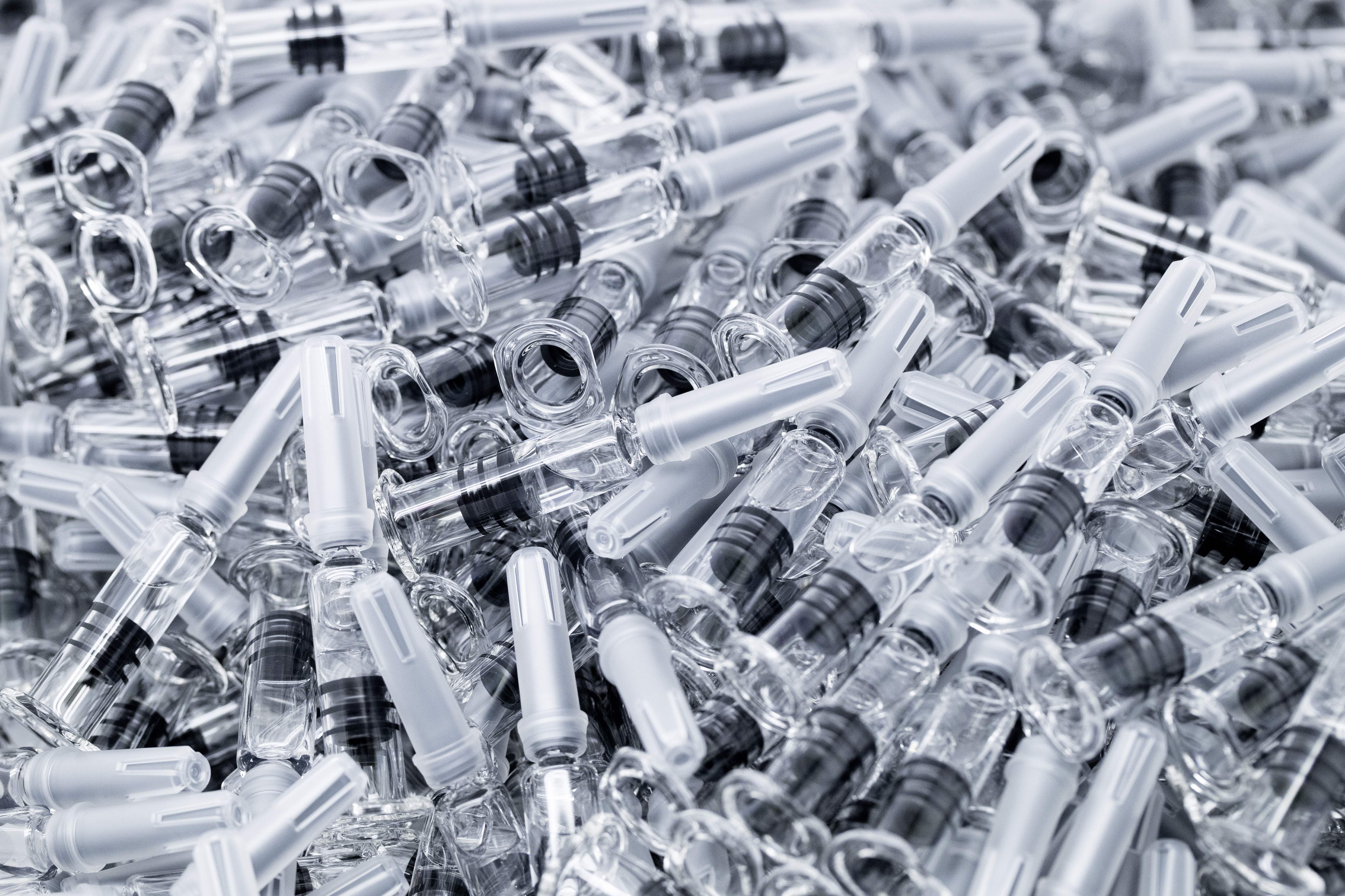 A photo shows vaccines in prefilled, single-use syringes before the inspection and packaging phase at the French pharmaceutical company Sanofi's world distribution centre in Val de Reuil on July 10, 2020. (Photo by JOEL SAGET / AFP) (Photo by JOEL SAGET/AFP via Getty Images)